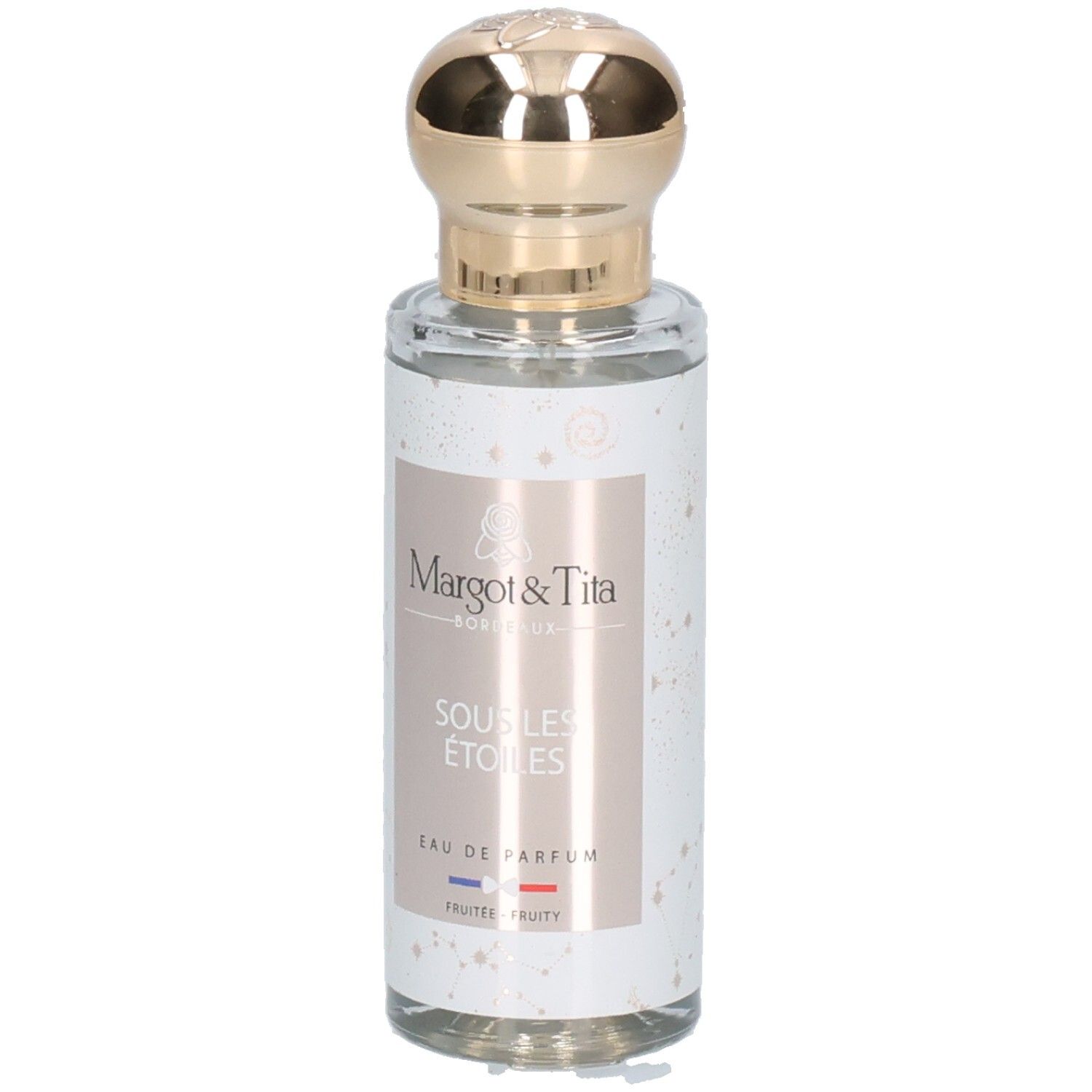 Flacon de parfum avec bouchon doré. Inscription: Margot & Tita, Sous Les Etoiles, Eau de Parfum. Drapeau français.