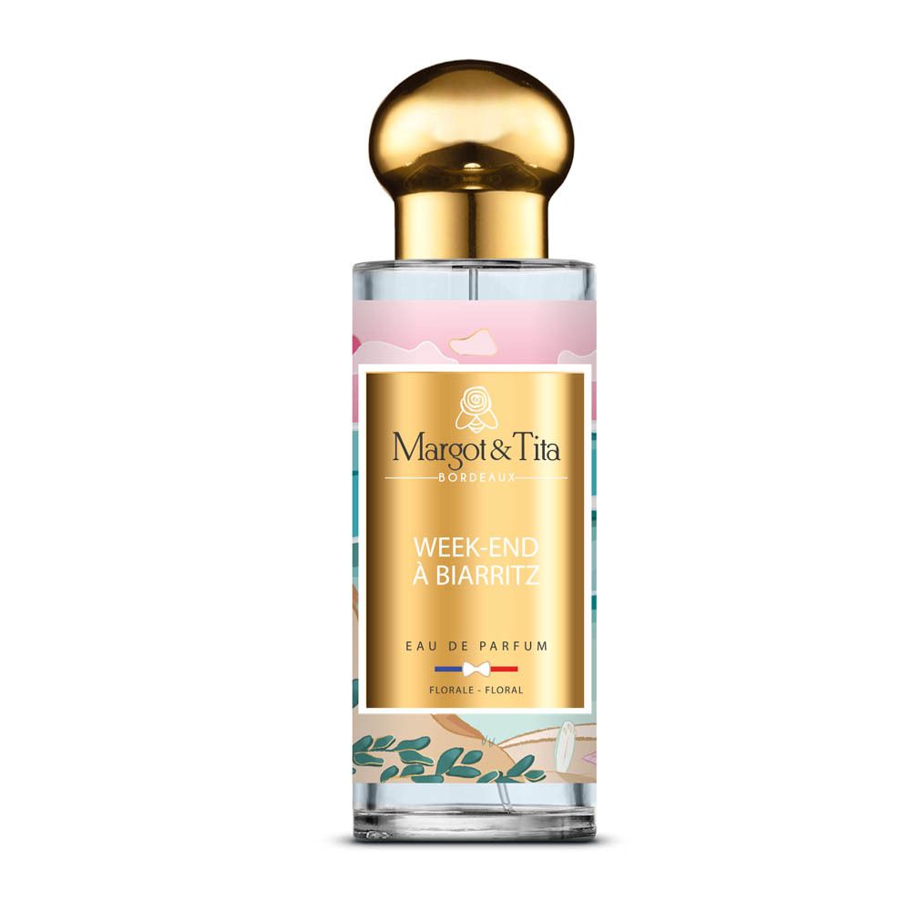 Flacon en verre avec bouchon doré. Étiquette "Margot & Tita" "Week-End à Biarritz" Eau de Parfum.