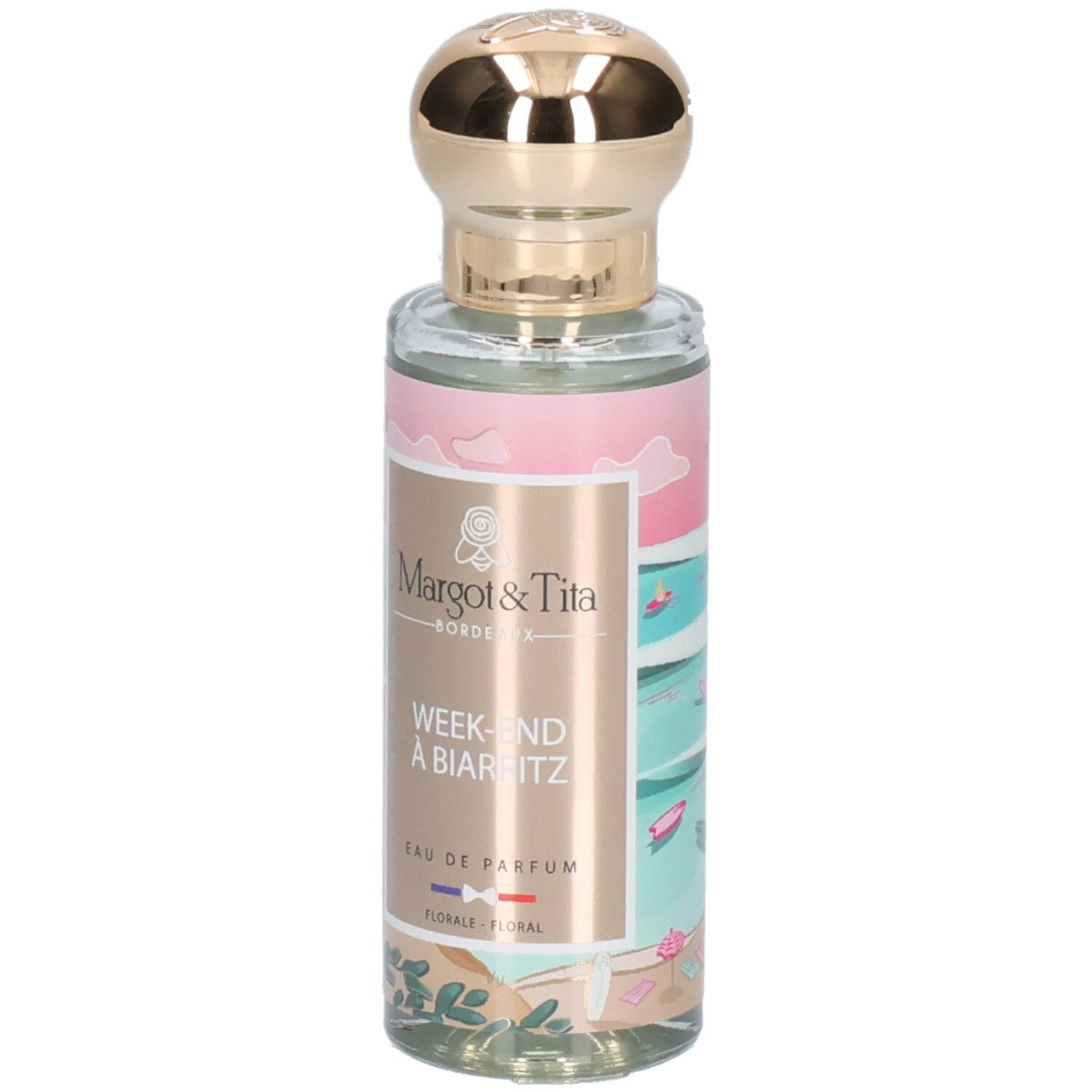 Flacon en verre avec bouchon doré. Étiquette "Margot & Tita" "Week-End à Biarritz" Eau de Parfum.