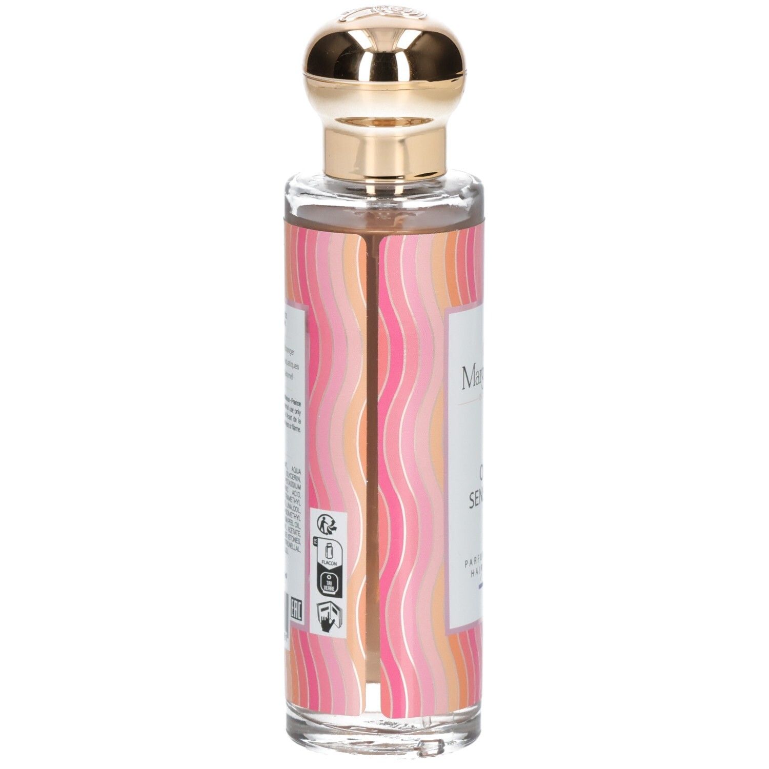 Flacon de parfum avec bouchon doré. Inscription: Onde Sensuelle. Marque: Margot & Tita. Texte au dos.