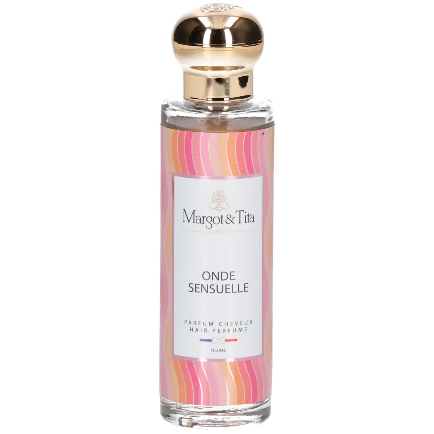 Flacon de parfum avec bouchon doré. Inscription: Onde Sensuelle, Parfum Cheveux. Marque: Margot & Tita.