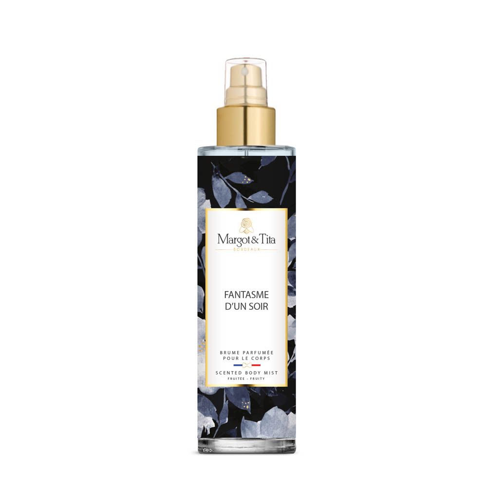Margot & Tita Fantasme Un Soir Bodyspray, 200ml. Flacon transparent à motif floral et vaporisateur doré.