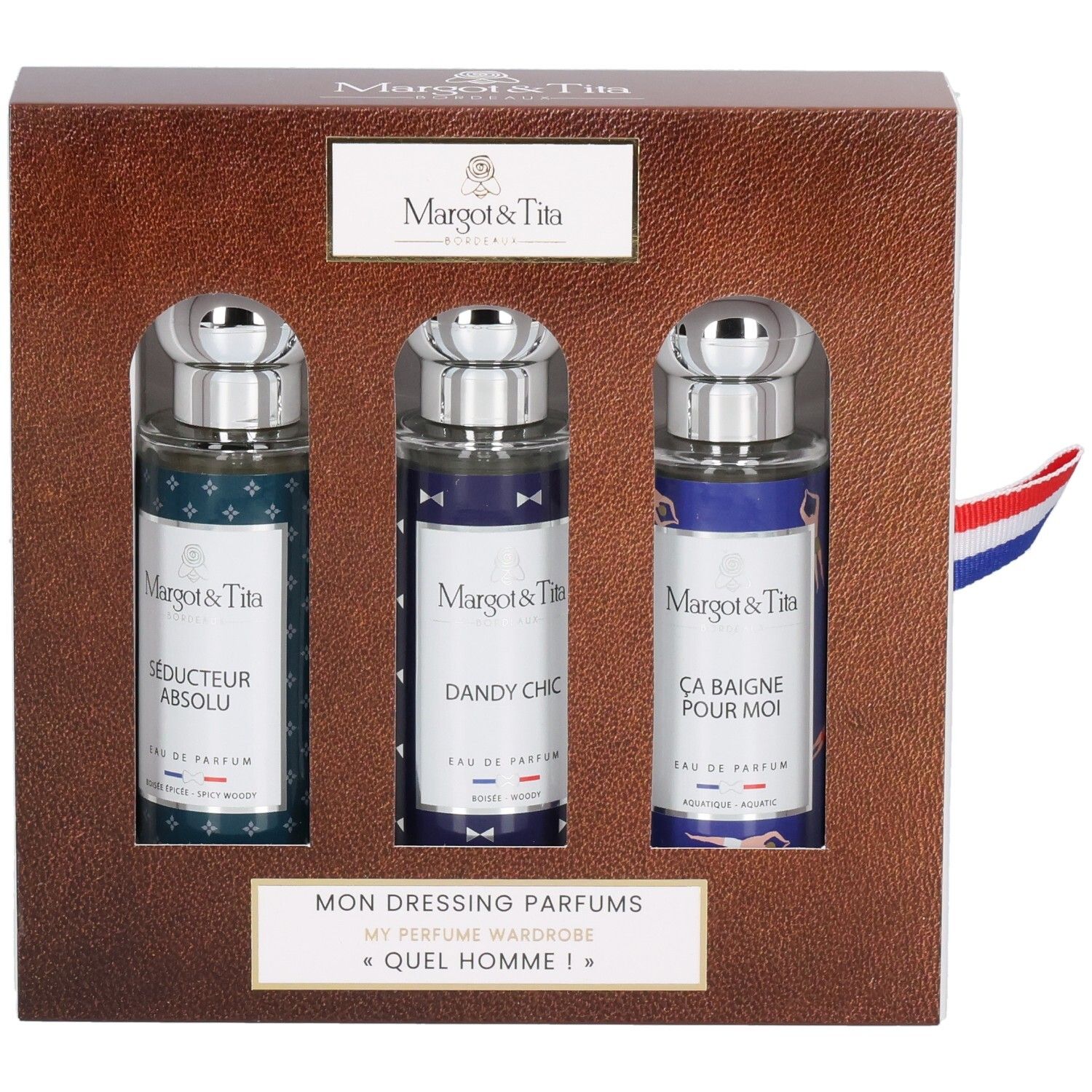 Coffret cadeau avec trois flacons de parfum. Boîte marron avec intérieur blanc. Ruban drapeau français.