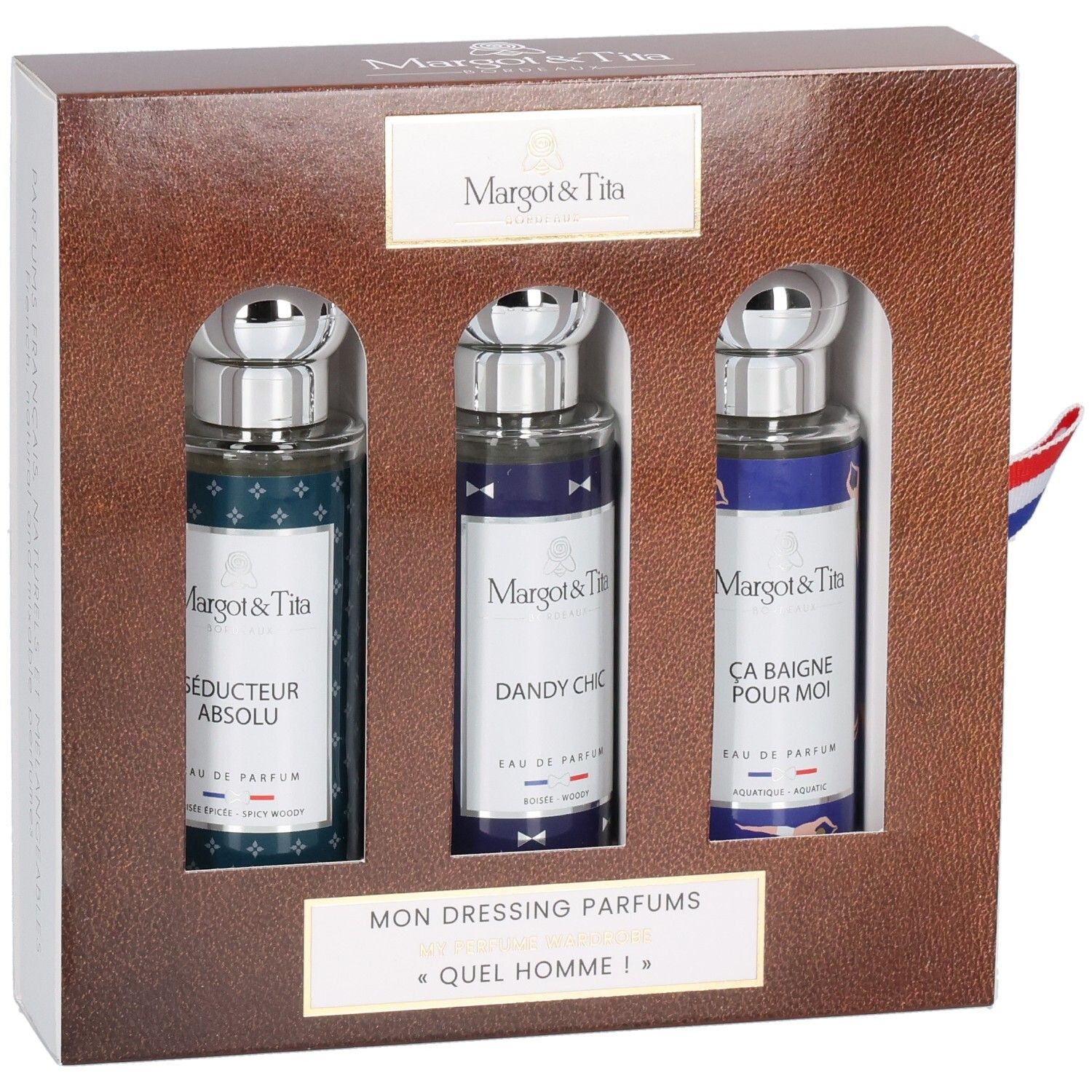 Coffret cadeau avec trois flacons de parfum. Boîte marron avec intérieur blanc. Ruban drapeau français.