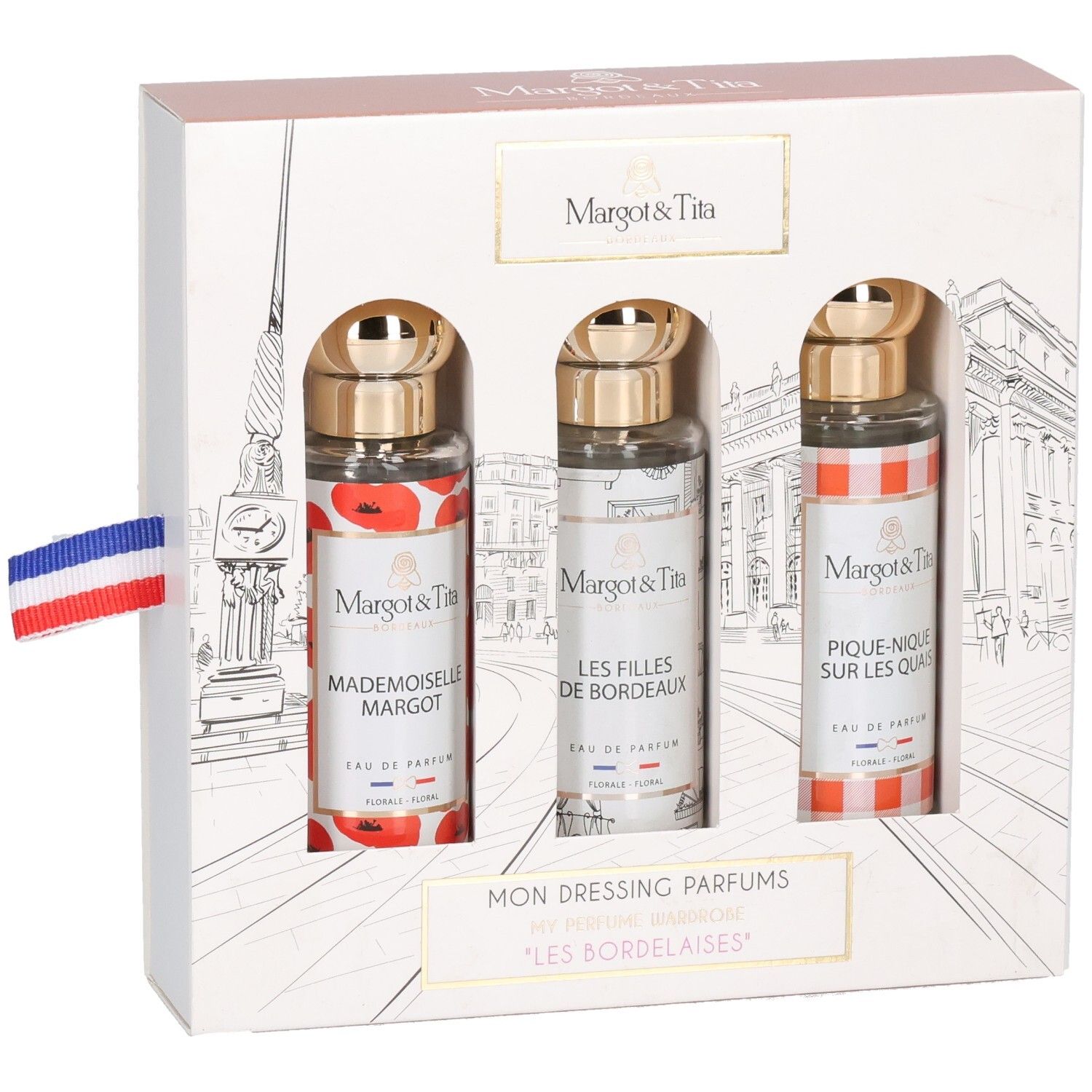 Coffret Margot & Tita, vue de trois quarts avant avec trois flacons de parfum et drapeau français.