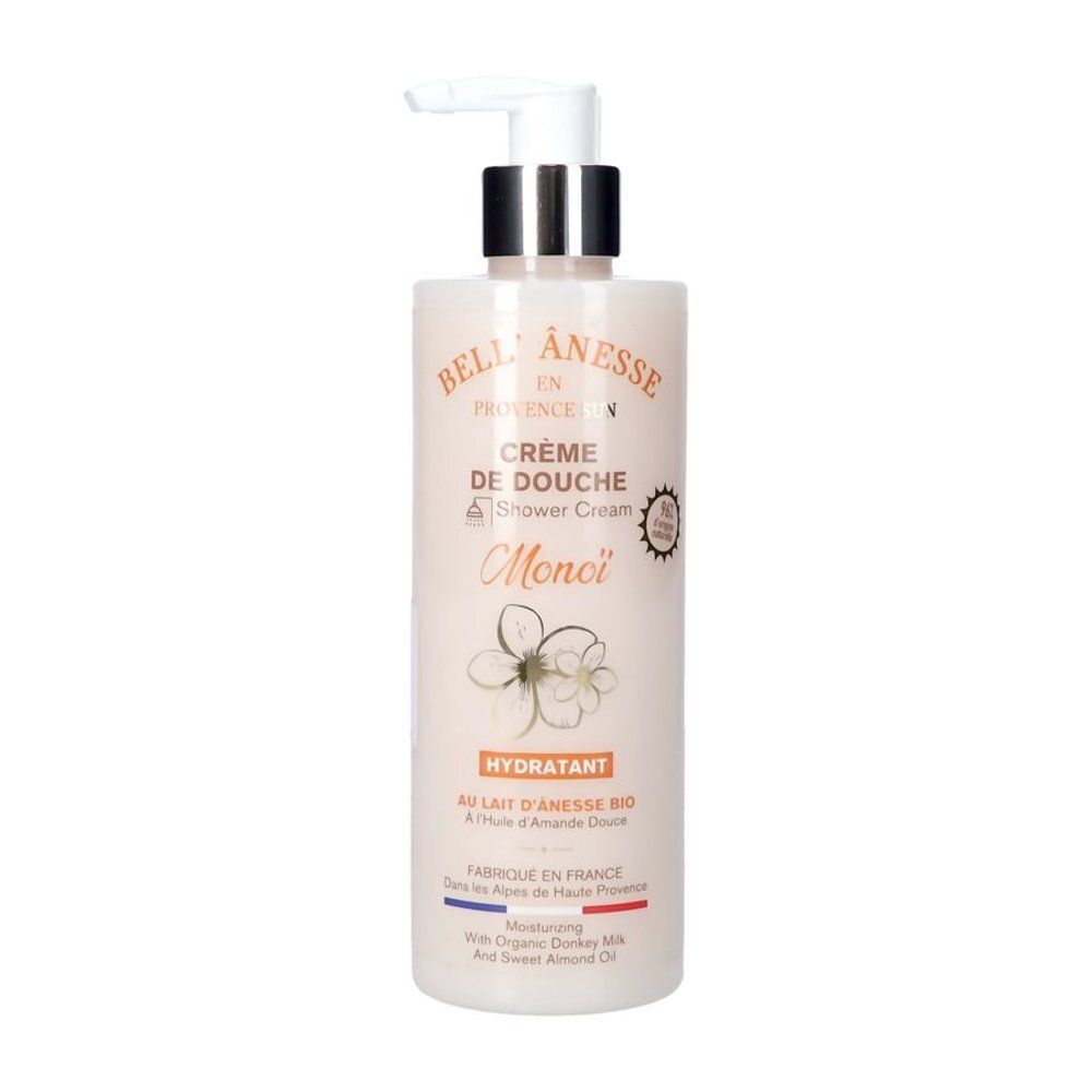 Flacon beige avec pompe. Inscription: Crème de Douche Monoï. Au lait d'ânesse bio et huile d'amande douce.