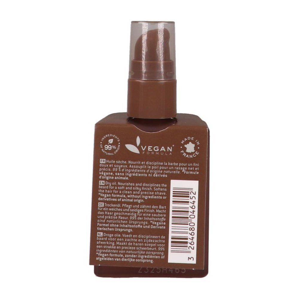 Flacon marron avec pompe. Logo Vegan et texte. Informations produit au dos.