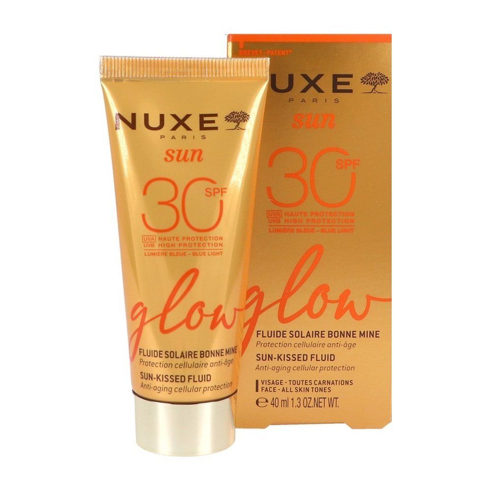 Fluide solaire Nuxe Sun SPF 30 et sa boîte d'emballage.