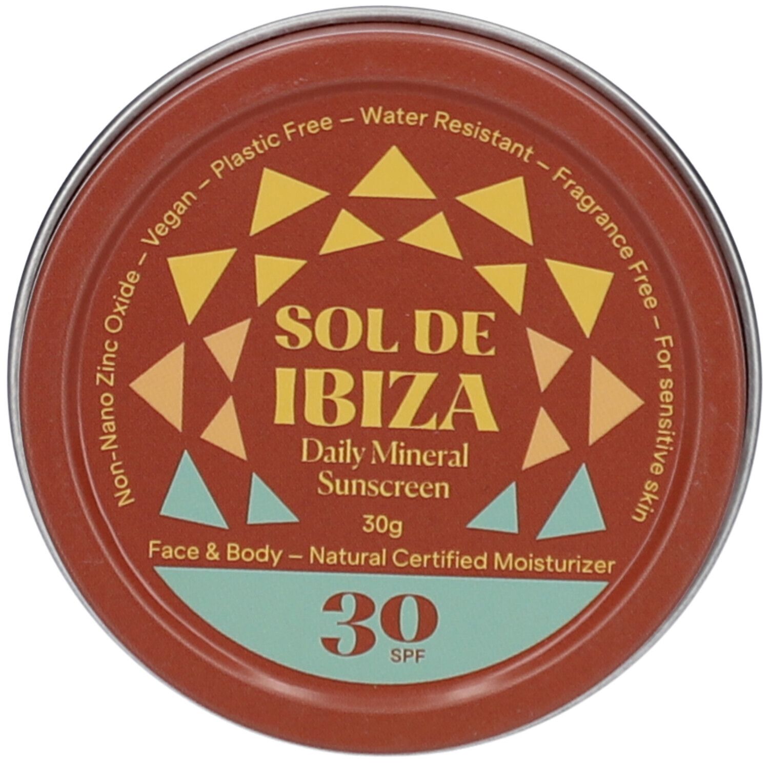 Vue de dessus d'une boîte ronde marron. Inscription : Sol de Ibiza, SPF30. Végétalien, résistant à l'eau, pour peaux sensibles.