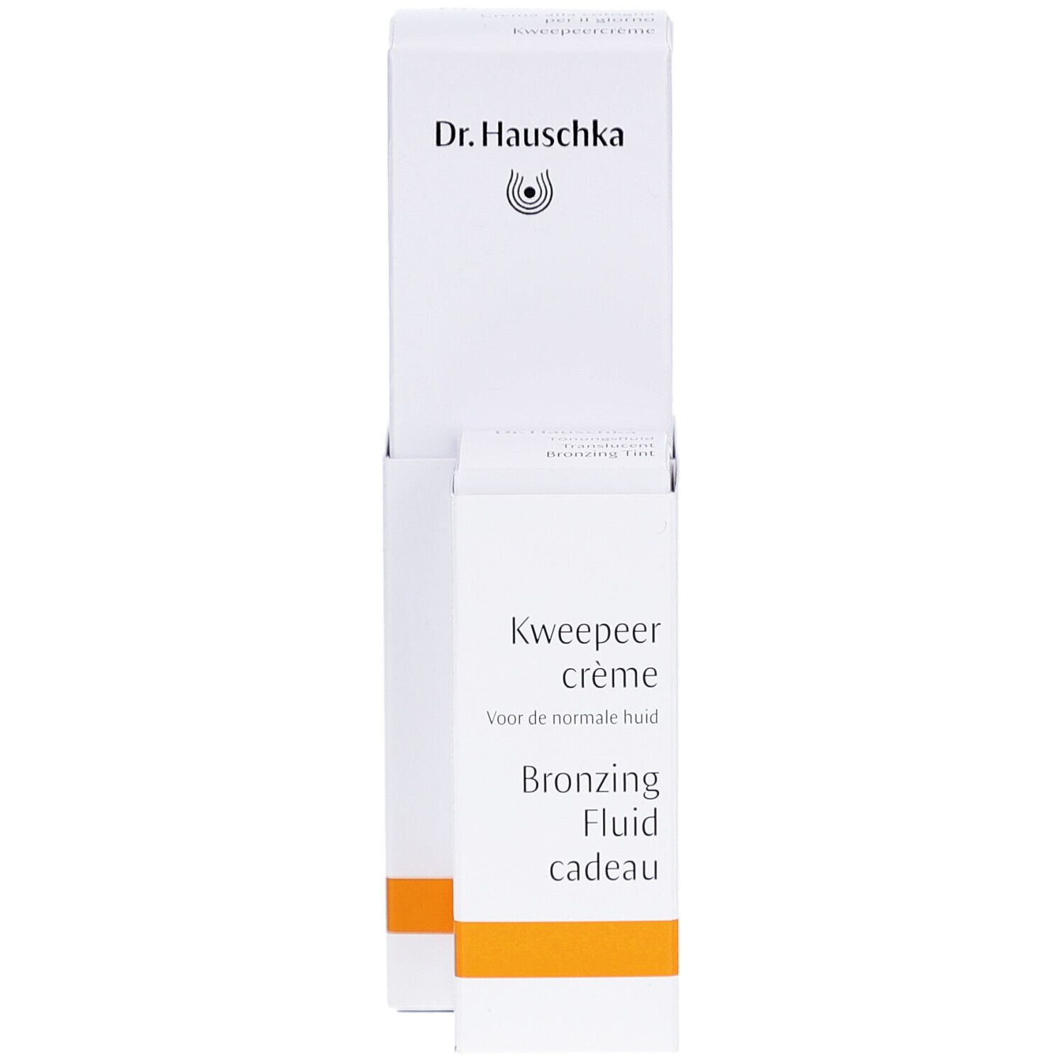 Emballage blanc avec texte et logo. Inscription: Kweepeer crème, Bronzing Fluid cadeau. Marque: Dr. Hauschka.