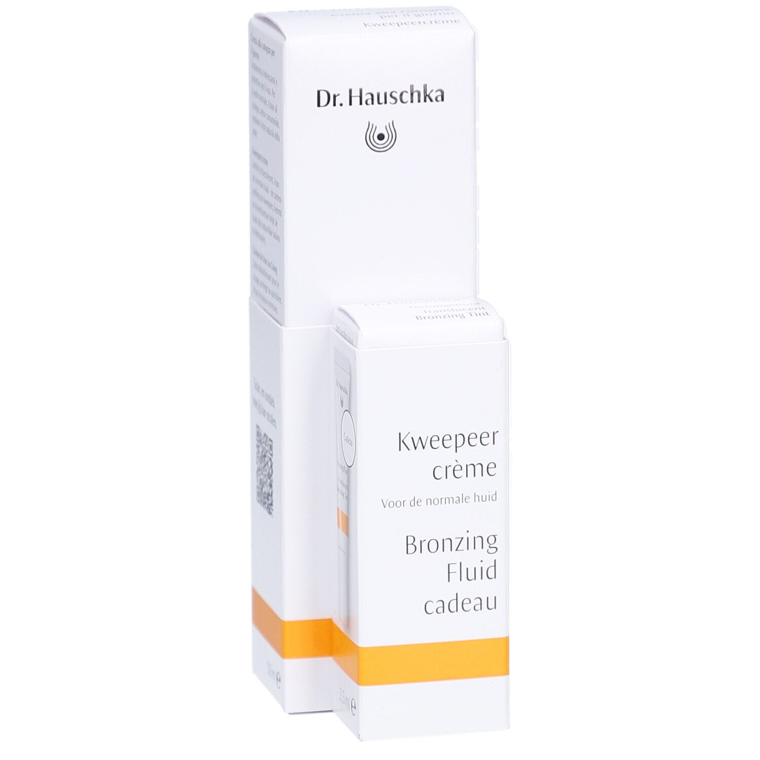 Emballage blanc avec texte et logo. Inscription: Kweepeer crème, Bronzing Fluid cadeau. Marque: Dr. Hauschka.