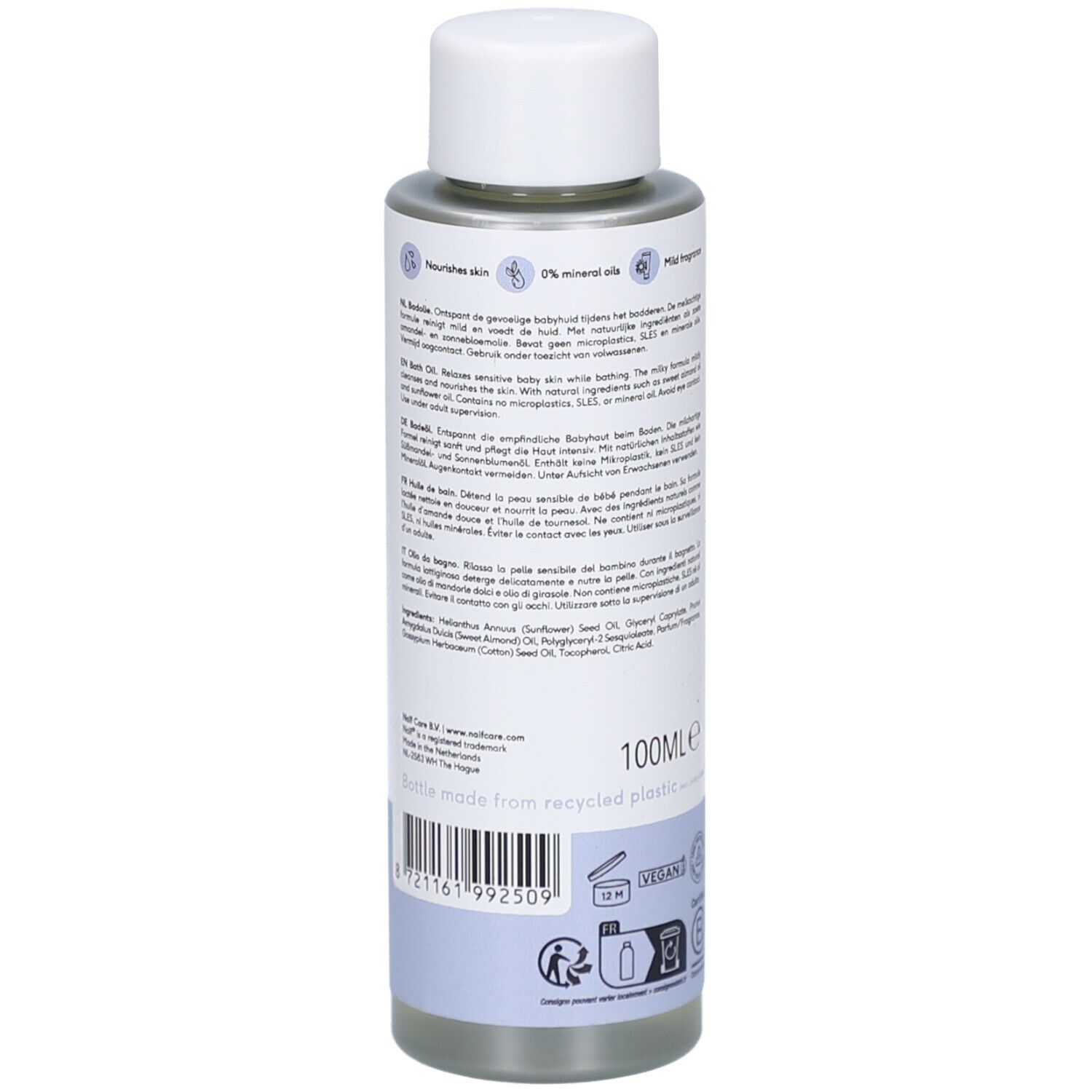 Dos du flacon d'huile de bain Naïf. Contient 100 ml. Avec certifications et ingrédients. Fabriqué à partir de plastique recyclé.