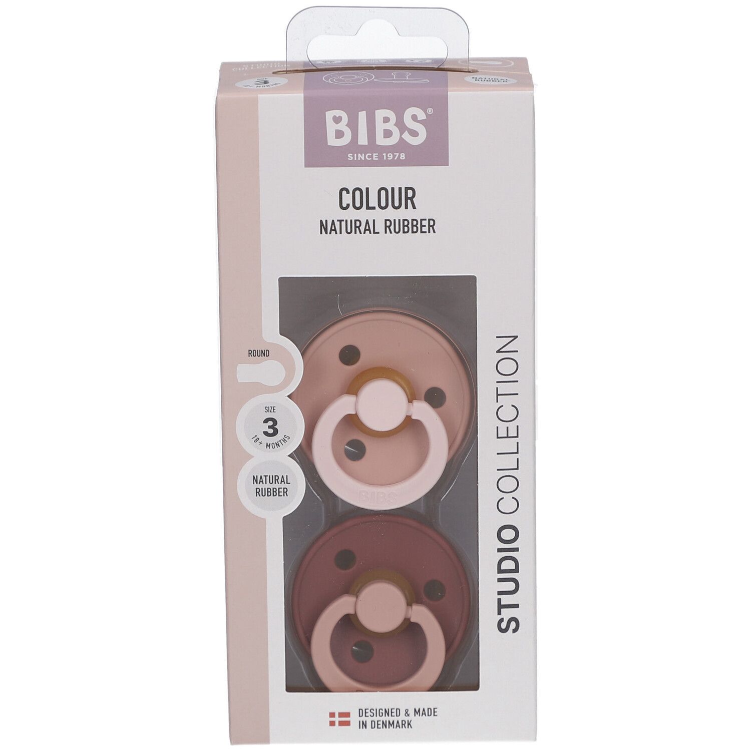 Emballage de deux sucettes. Logo BIBS et nom du produit. Fenêtre montrant les sucettes roses et marron. Taille 3.