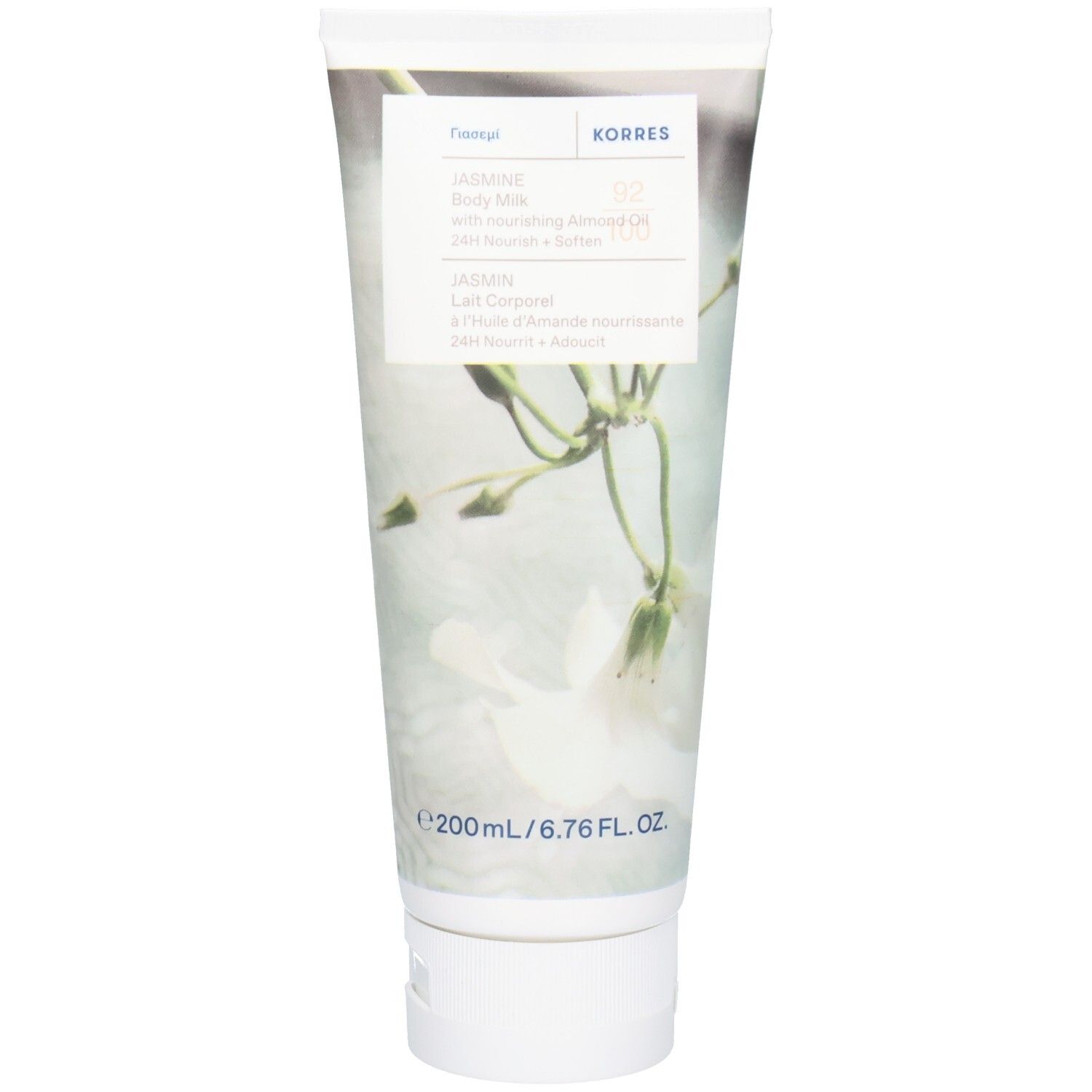 Tube blanc avec motif de fleur de jasmin. Contient Korres Lait Corporel Jasmin.