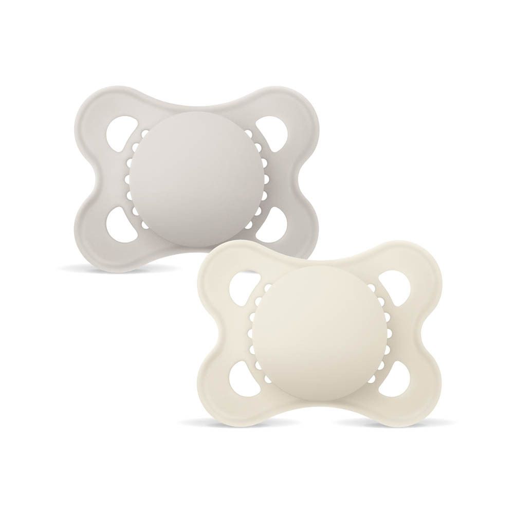 Deux sucettes MAM Original en silicone, gris et beige, 0-6 mois, isolées.