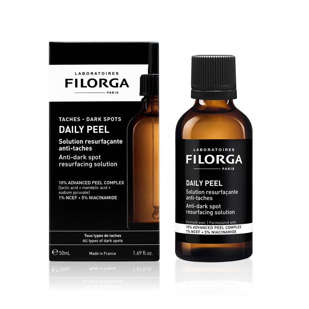 Flacon Filorga DAILY PEEL. Flacon en verre brun avec bouchon noir. Nom du produit et logo.