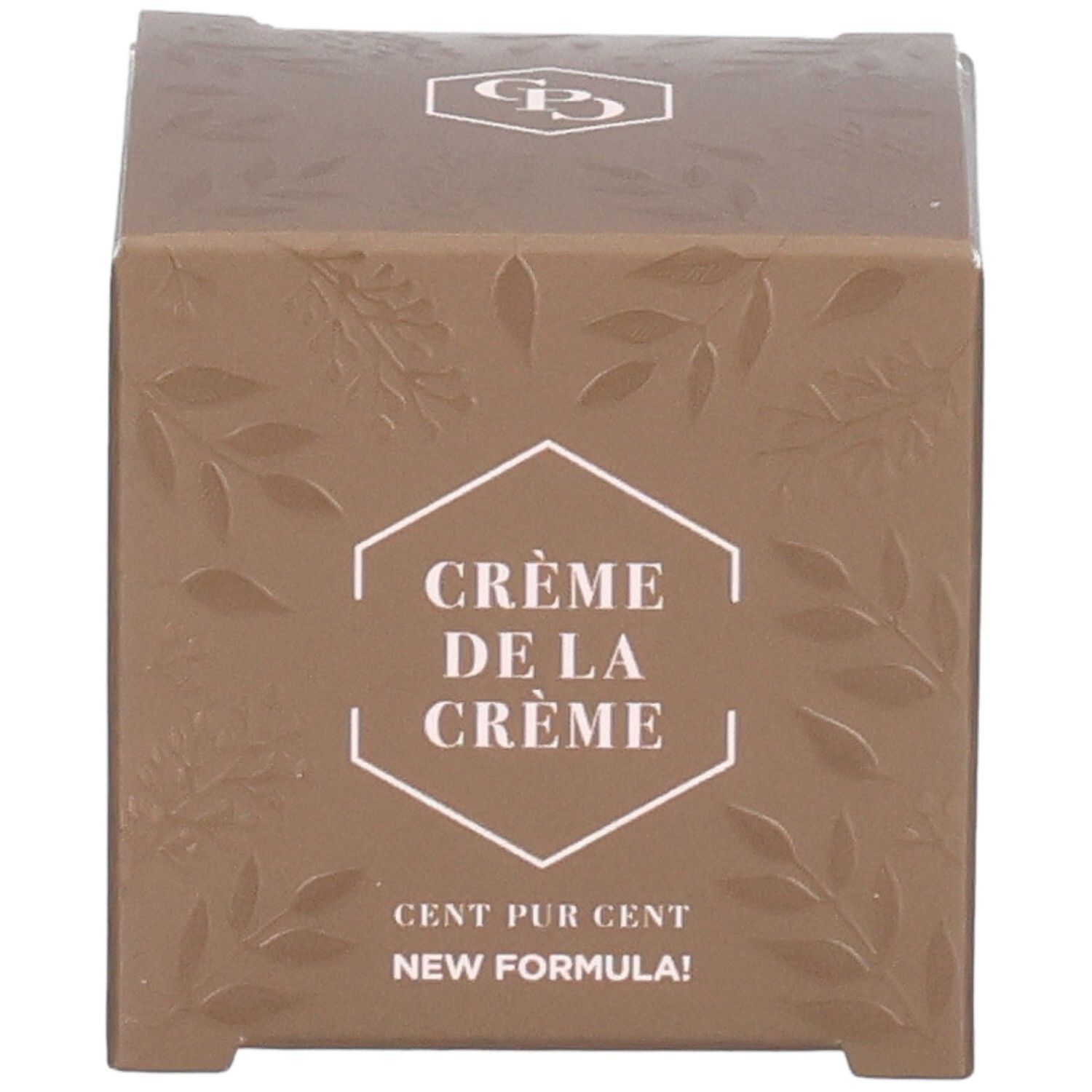 Boîte marron avec feuilles en relief. Texte : Crème de la Crème, Cent Pur Cent, New Formula. Logo en haut.