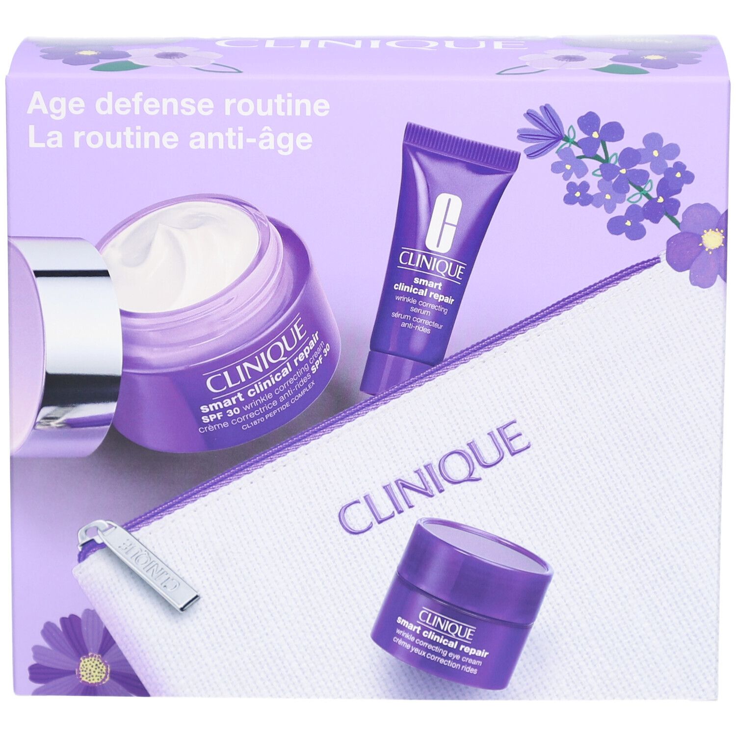Coffret cadeau avec crèmes, tube et trousse. Emballage violet. Marque Clinique.