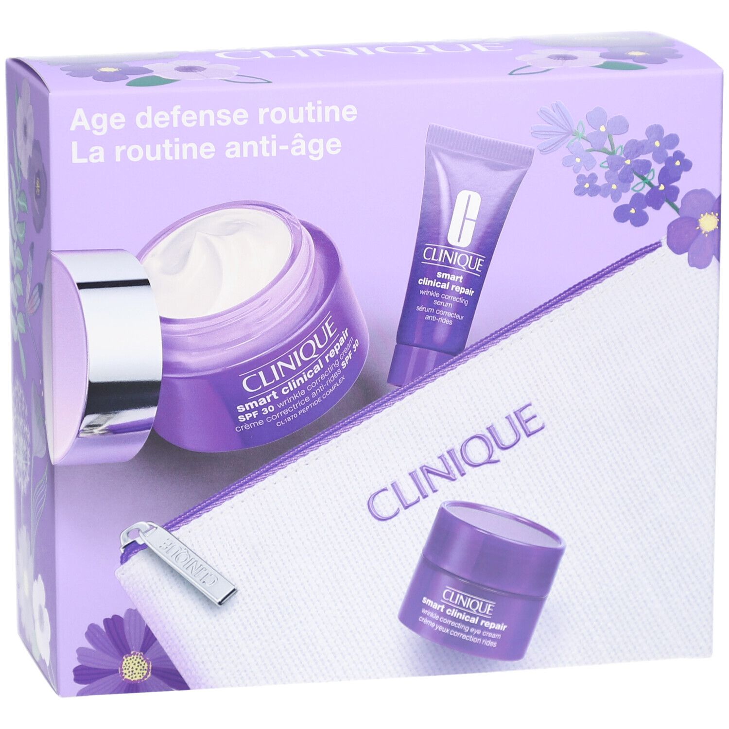 Coffret cadeau avec crèmes, tube et trousse. Emballage violet. Marque Clinique.