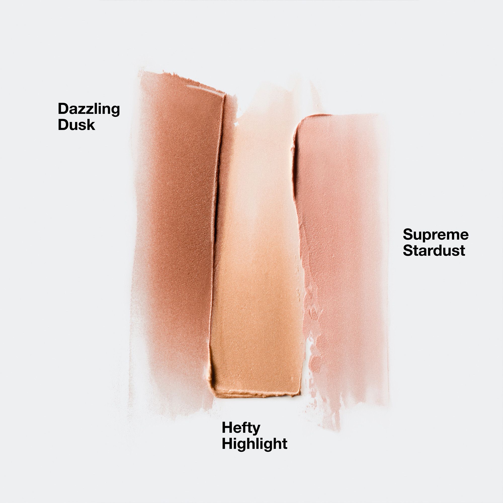 Trois traits d'highlighter. Noms: 'Dazzling Dusk', 'Hefty Highlight', 'Supreme Stardust'.