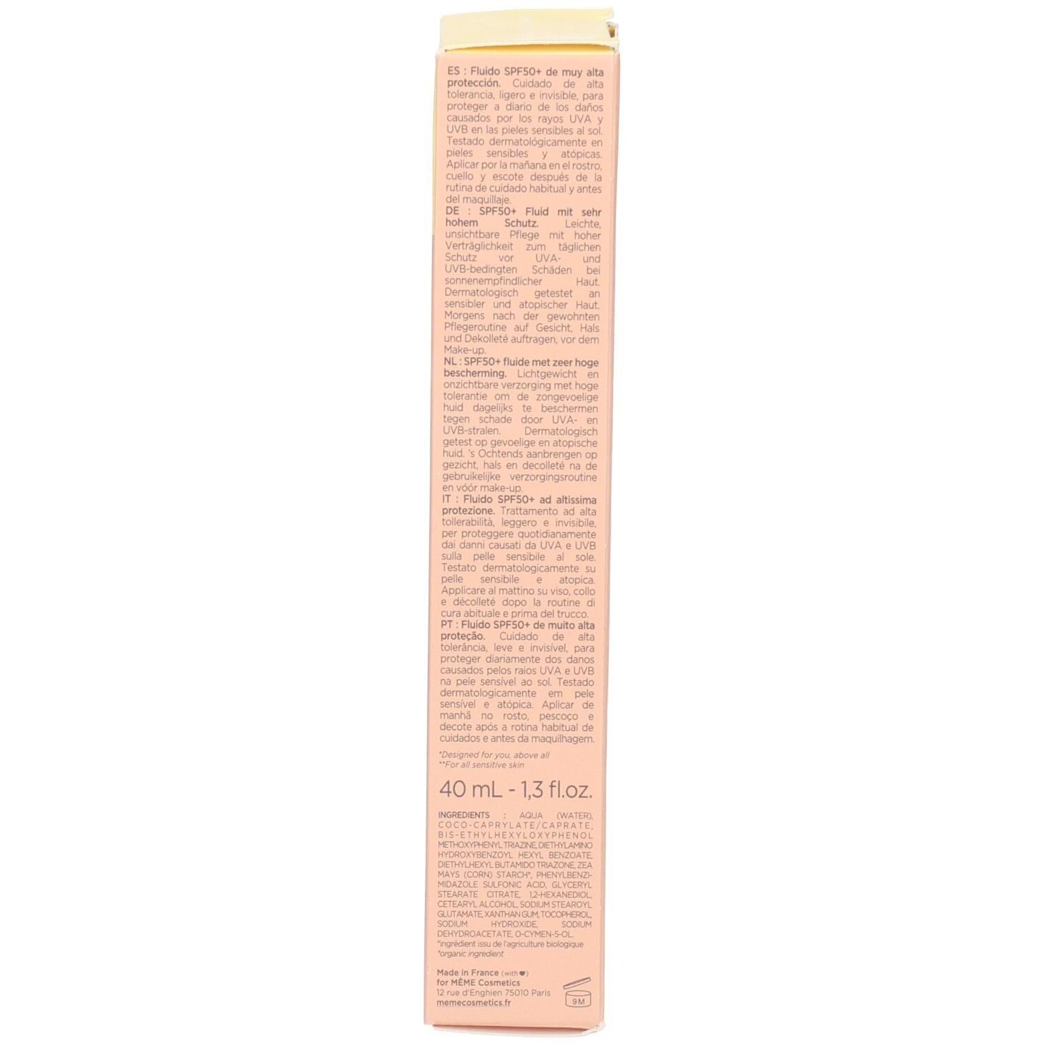 Côté de l'emballage du produit. Texte multilingue. Carton beige.