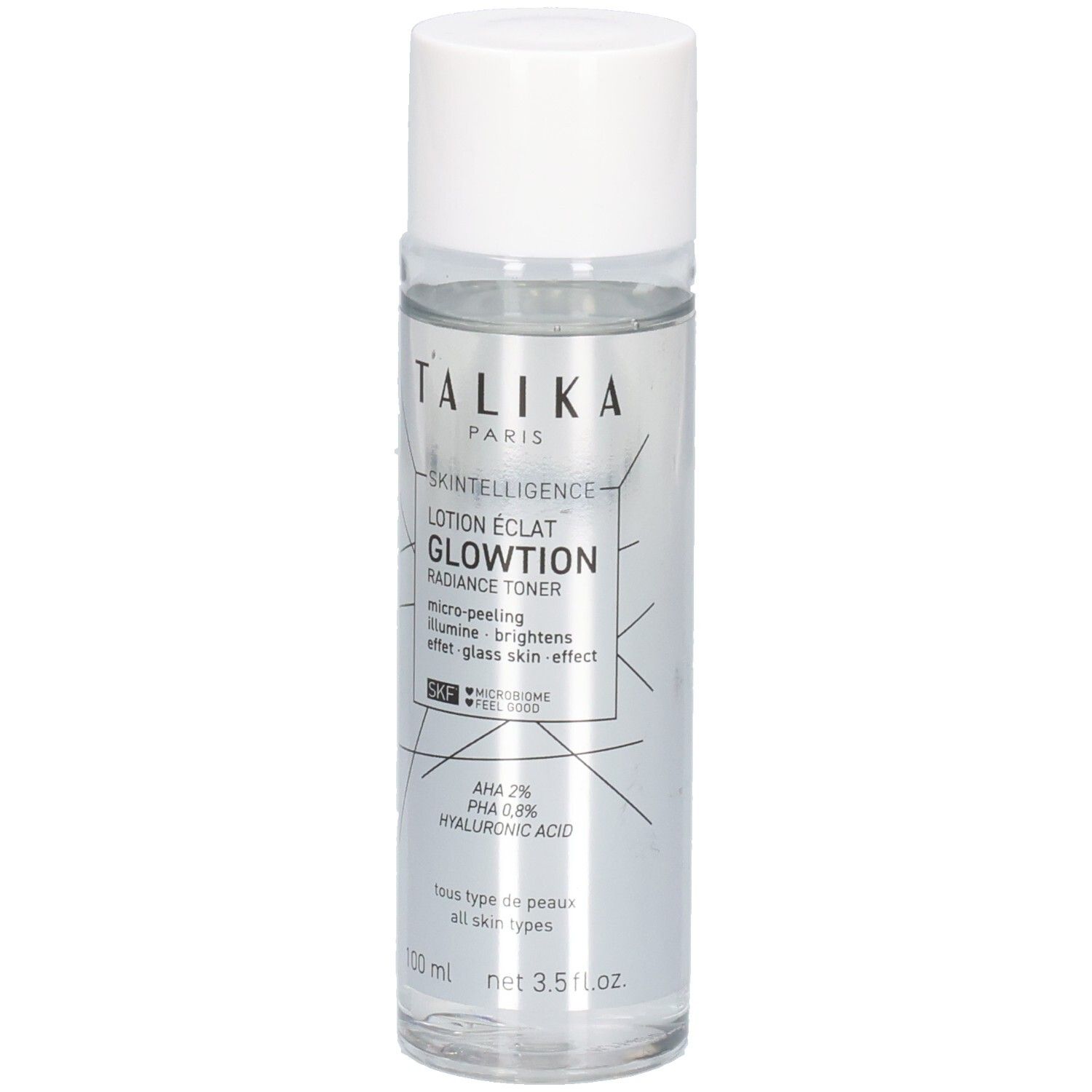 Flacon transparent, bouchon blanc. Inscription: TALIKA PARIS, GLOWTION, AHA 2%, acide hyaluronique. Volume: 100 ml.