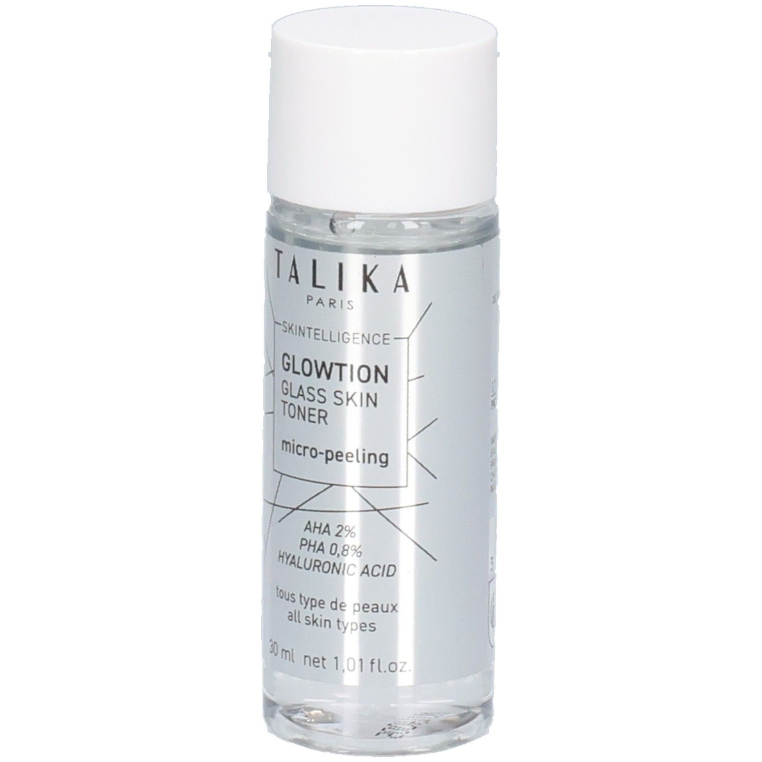 Flacon cylindrique transparent avec bouchon blanc. Contient du toner. Inscriptions: Talika, Glowtion, Glass Skin Toner.