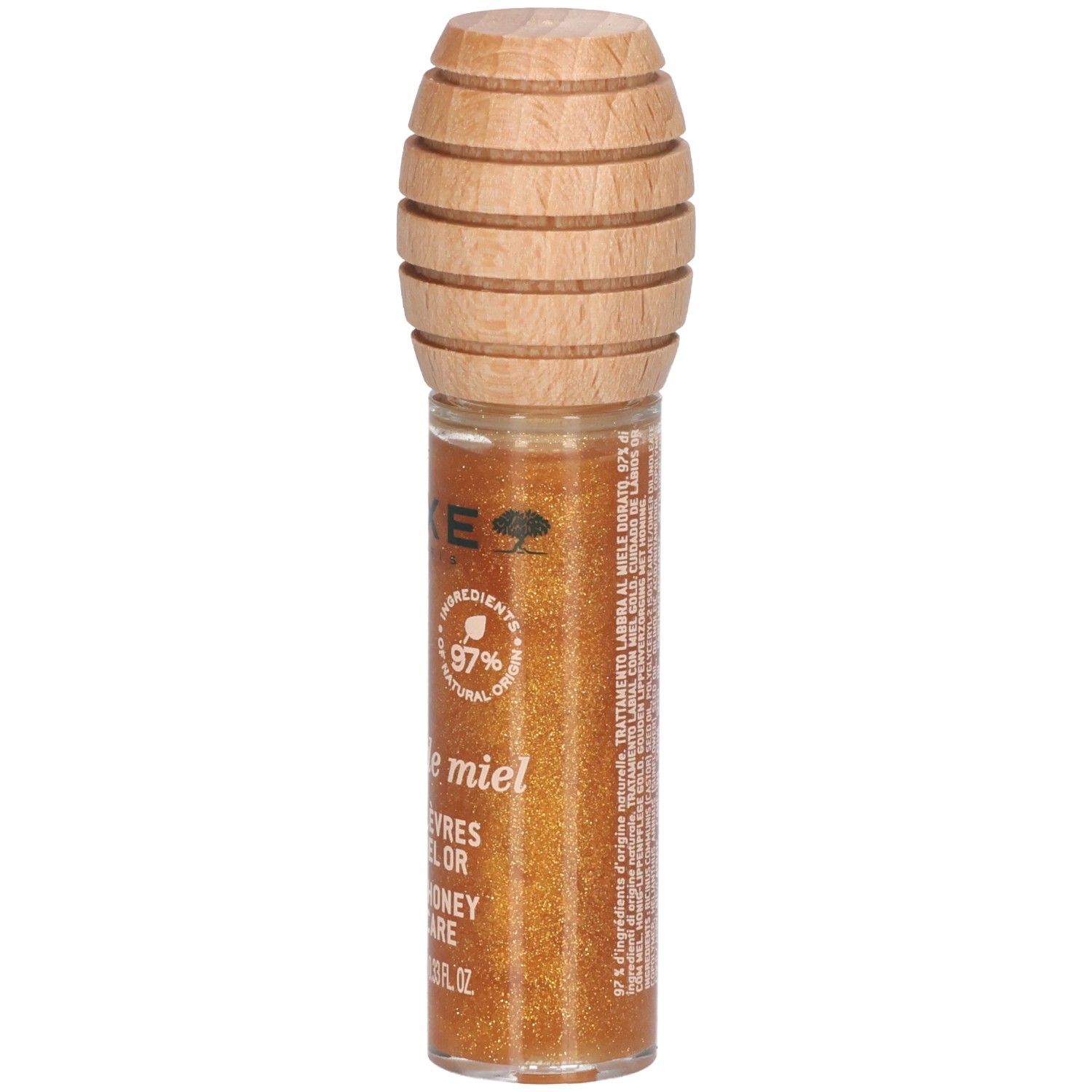 Gloss doré en flacon de verre avec bouchon en bois. Inscription: Nuxe, Rêve de miel, Soin Lèvres au Miel Or, Gold Honey Lip Care, 97% ingrédients naturels.