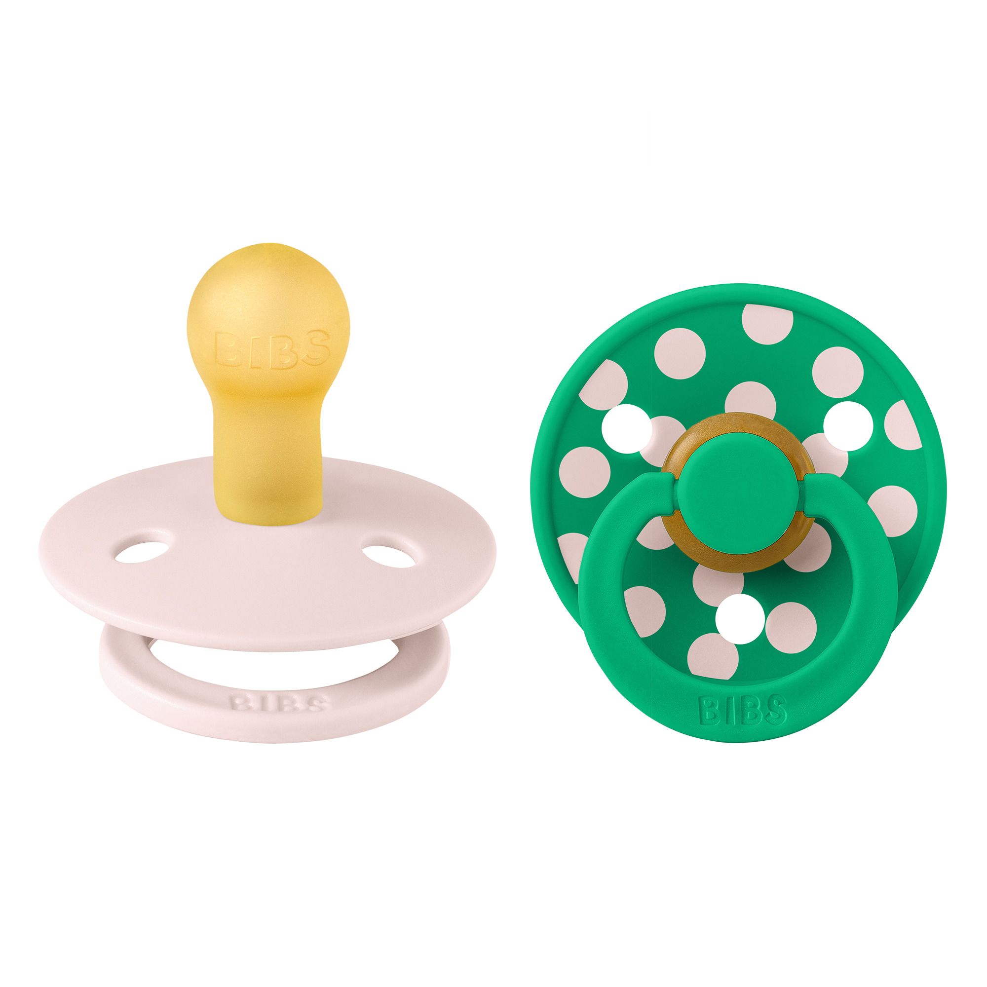 Deux sucettes. Sucette rose et verte à pois blancs. Marque : BIBS. Caoutchouc naturel.