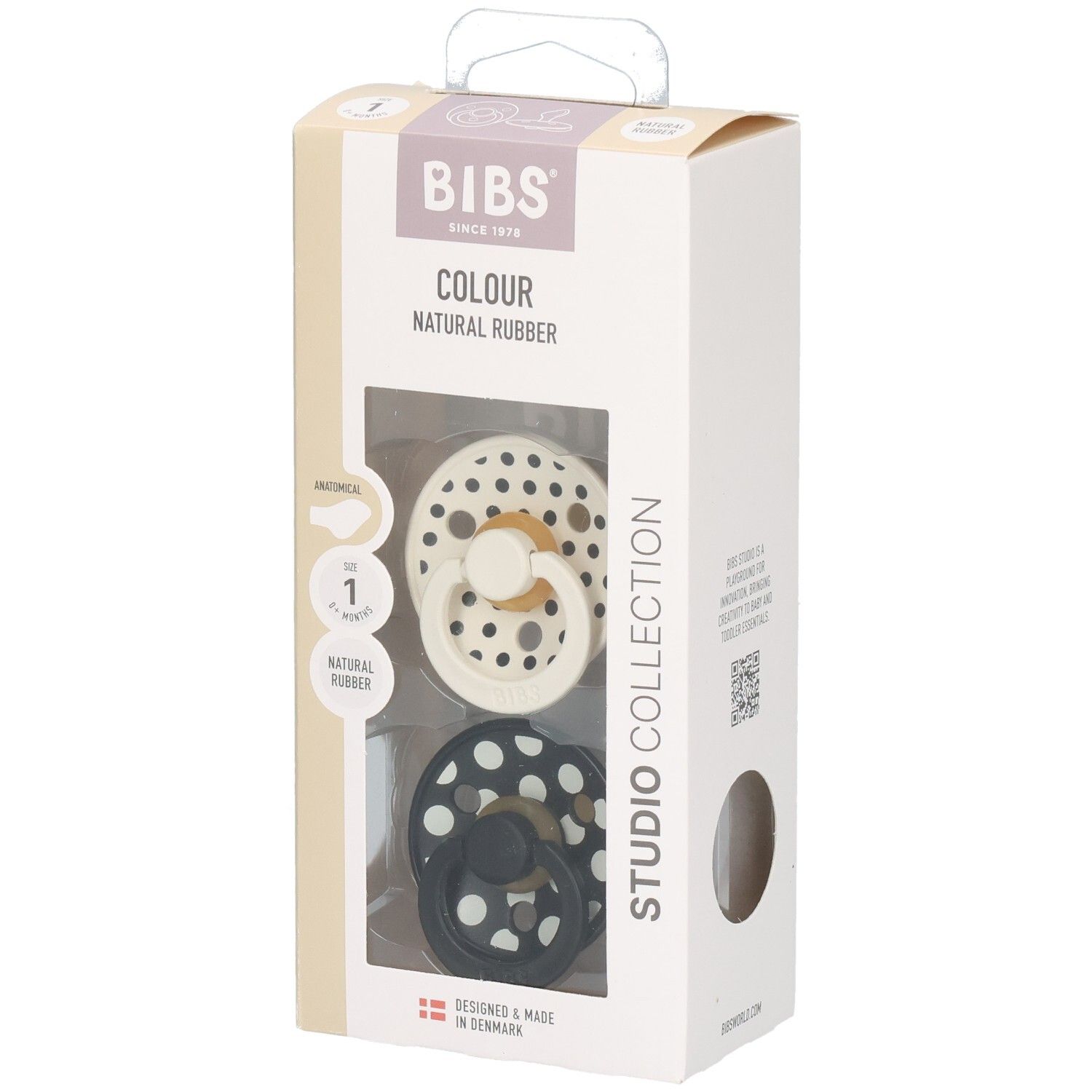 Boîte de deux sucettes BIBS. Motif à pois. Tétine anatomique. Caoutchouc naturel. Couleurs : noir et crème.