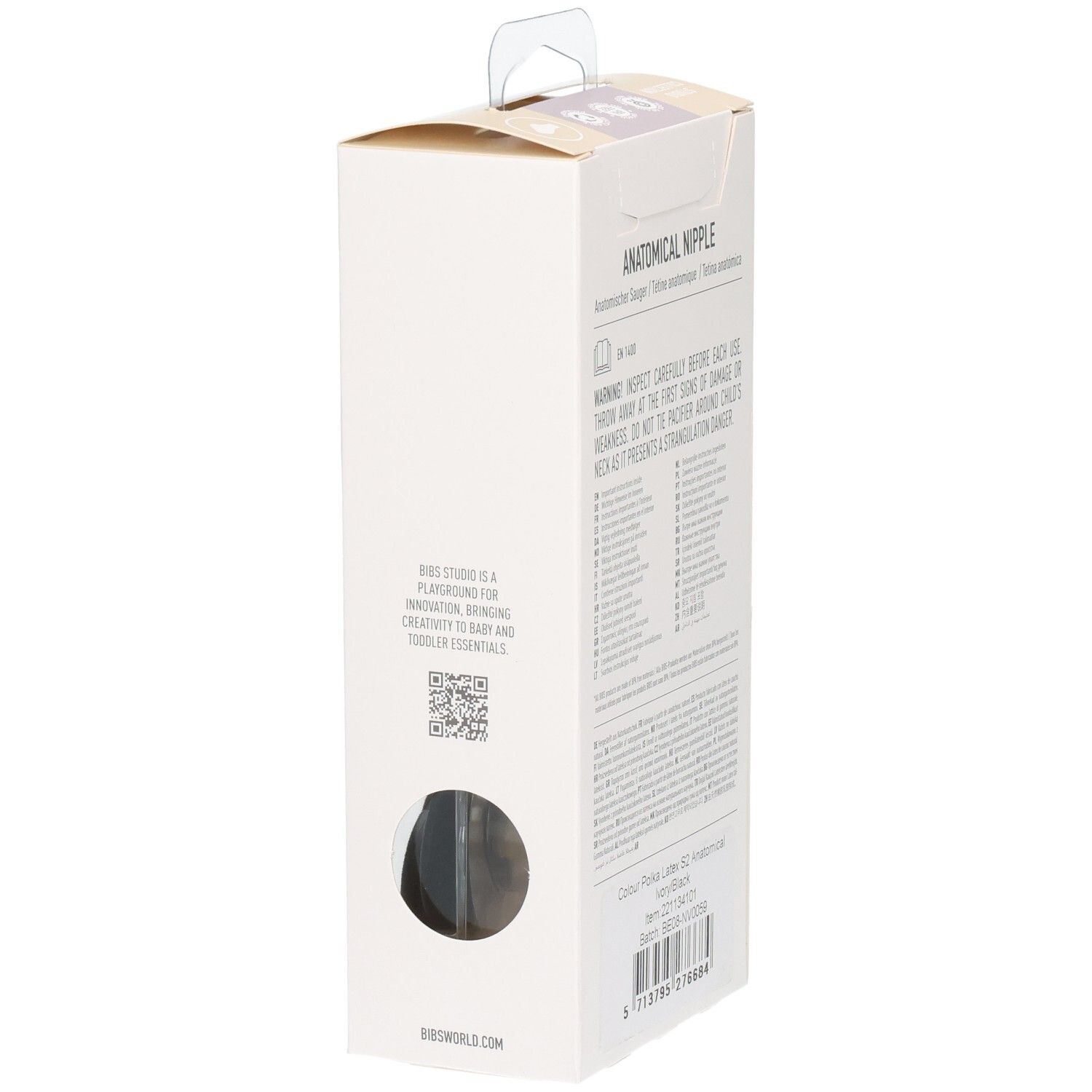Dos de la boîte. Tétine anatomique. Avertissements et informations produit.