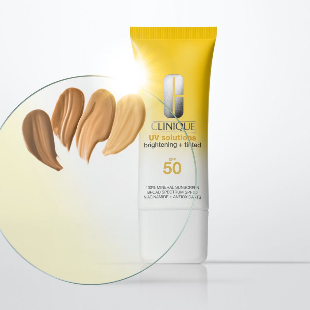 Boîte Clinique UV Solutions crème solaire teintée SPF 50, Medium.