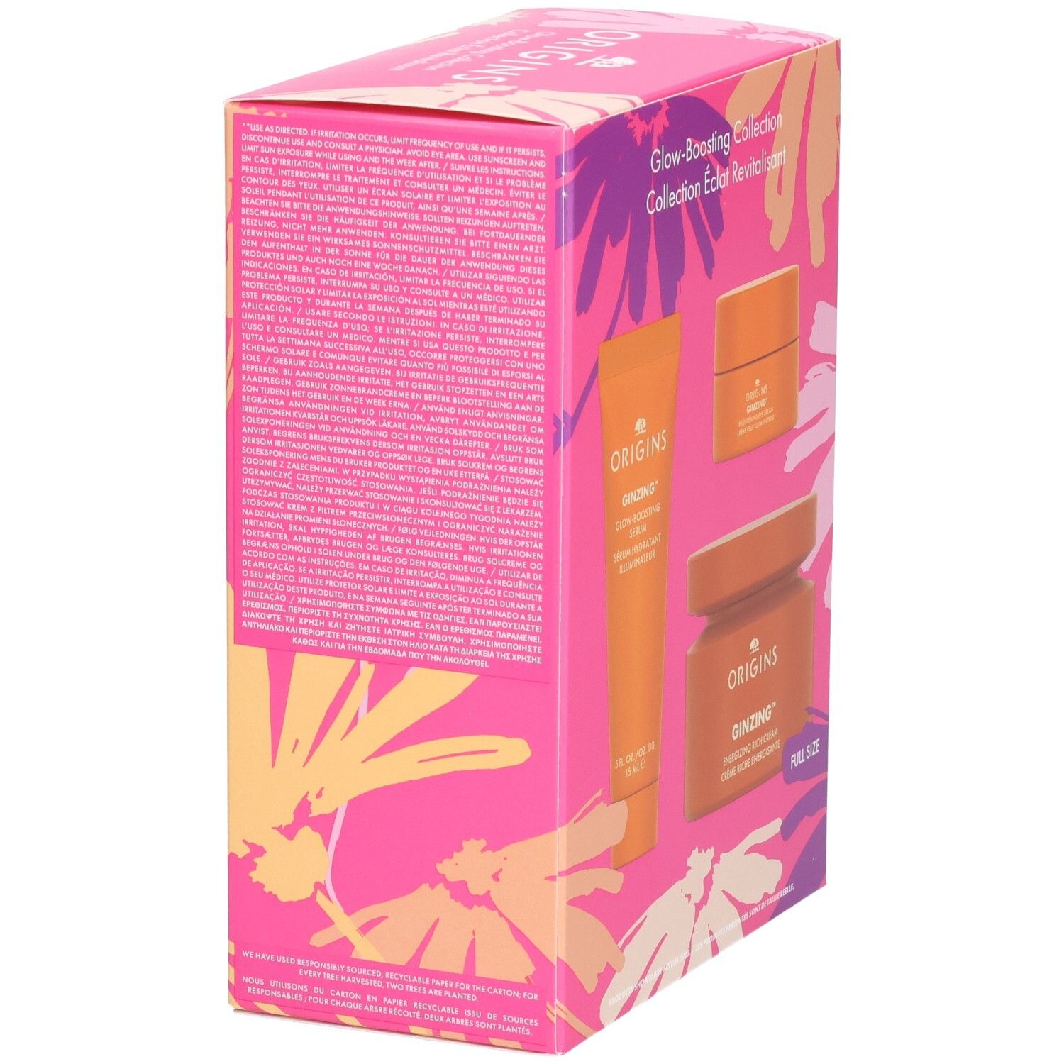 Emballage de la collection Origins Glow-Boosting. Texte sur le côté. Produits: Ginzing Glow-Boosting Serum, crème pour les yeux, crème riche. Motif floral.