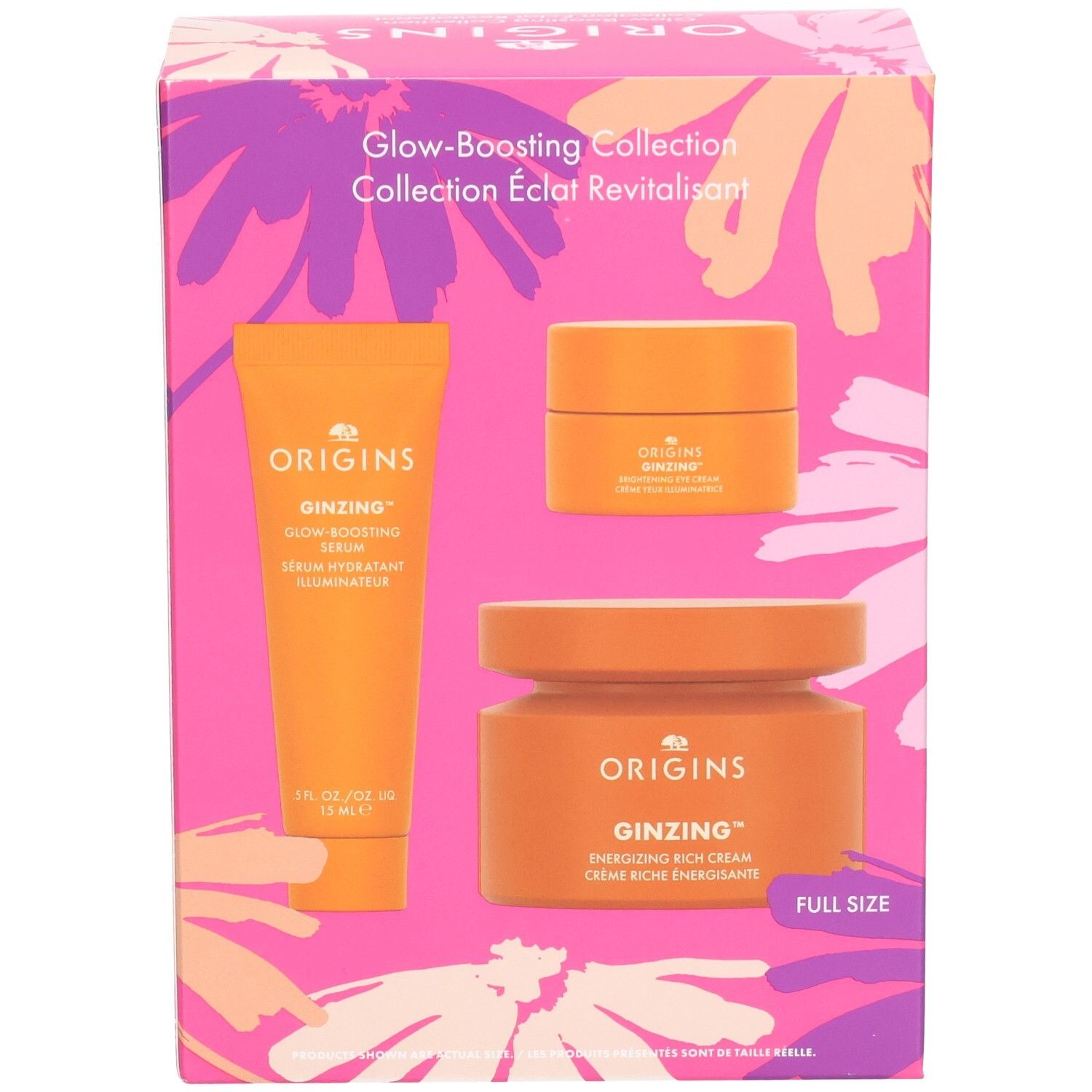 Coffret cadeau avec trois produits oranges. Inscriptions: Origins, Ginzing, Glow-Boosting Serum, Energizing Rich Cream. Emballage floral.