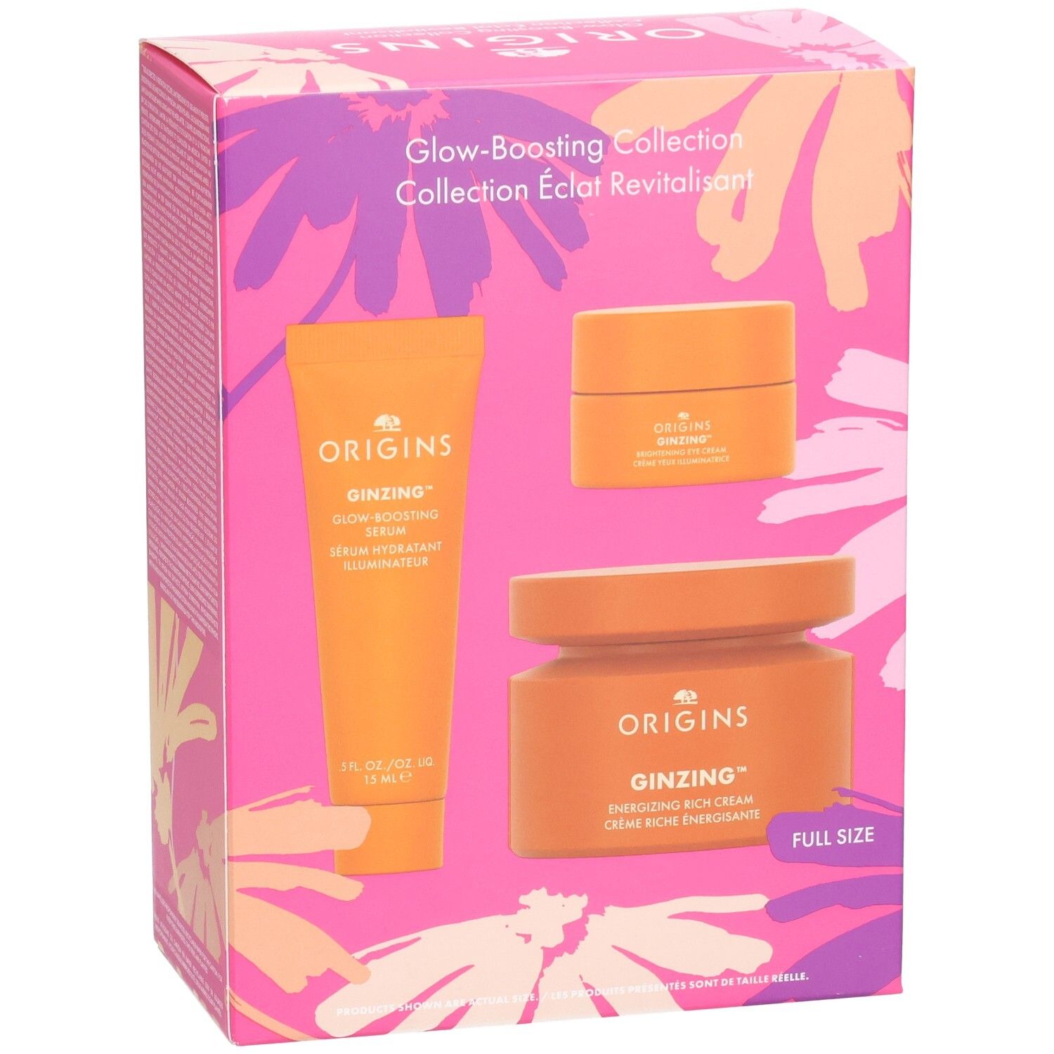 Coffret cadeau avec trois produits oranges. Inscriptions: Origins, Ginzing, Glow-Boosting Serum, Energizing Rich Cream. Emballage floral.