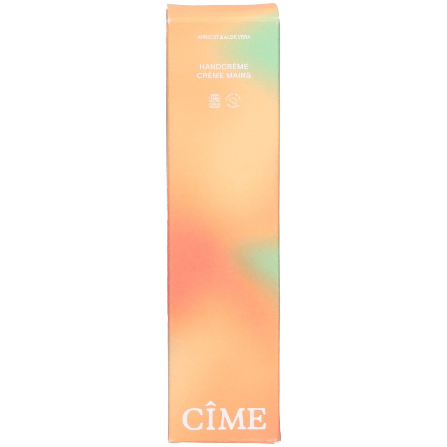 Emballage avec dégradé orange-vert. Inscriptions : Handcrème, Cîme. Texte : Apricot & Aloe Vera. Symboles de développement durable.