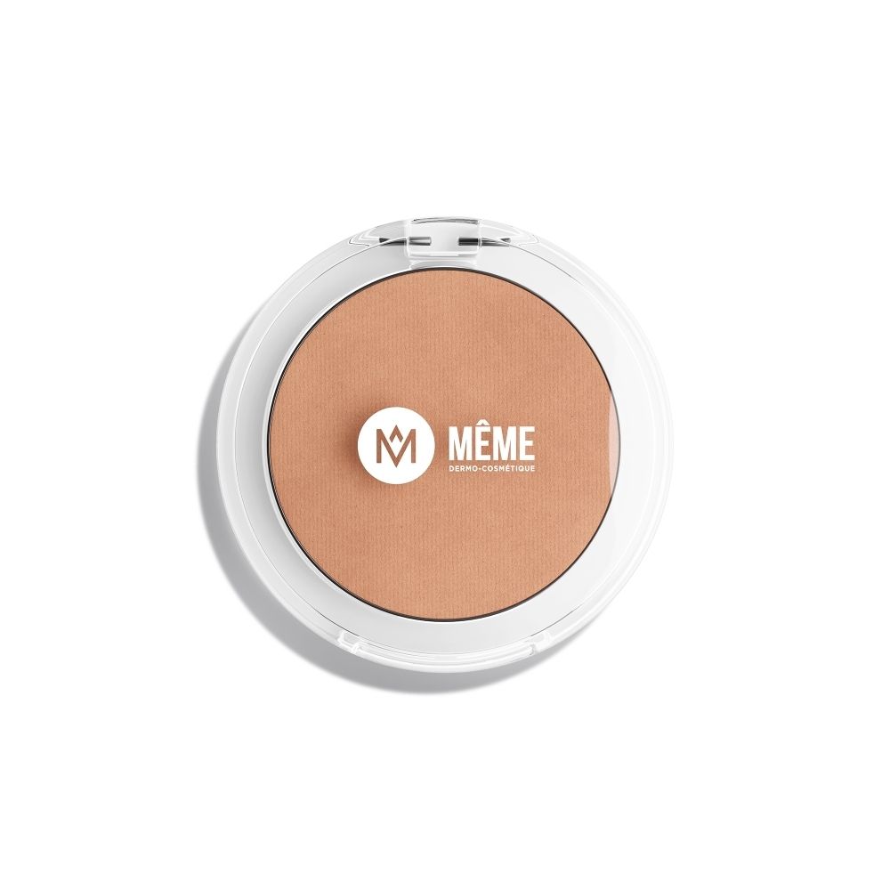 Poudre bronzante « La Poudre Bonne Mine » dans un boîtier rond avec couvercle transparent.