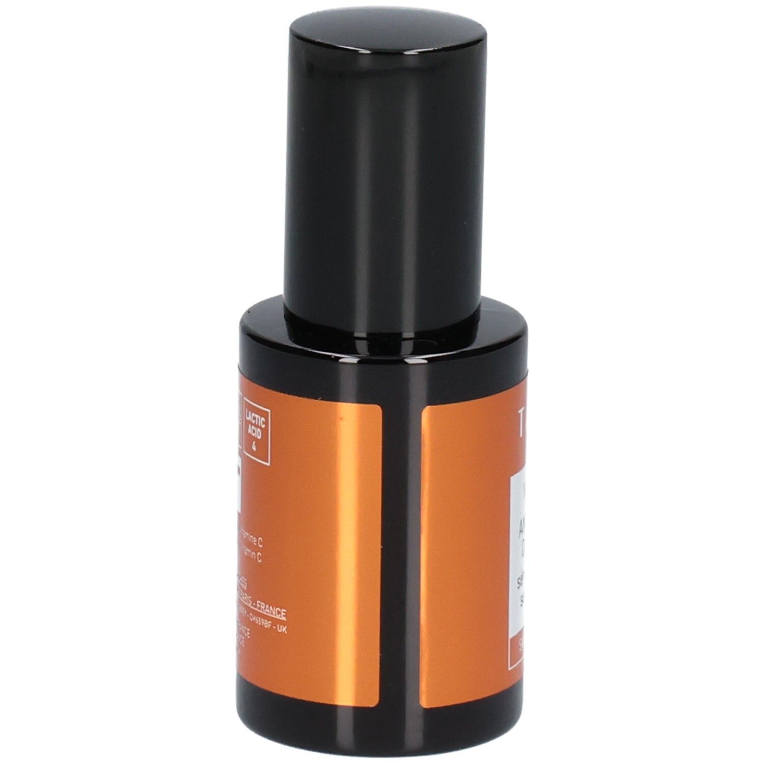 Flacon avec étiquette montrant Vitamine C, Niacinamide et Prébiotiques.