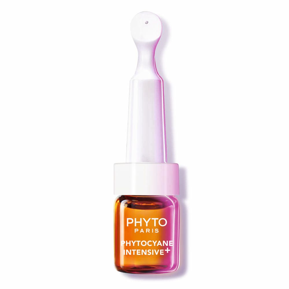 Petite ampoule Phyto Paris avec liquide orange et applicateur blanc.