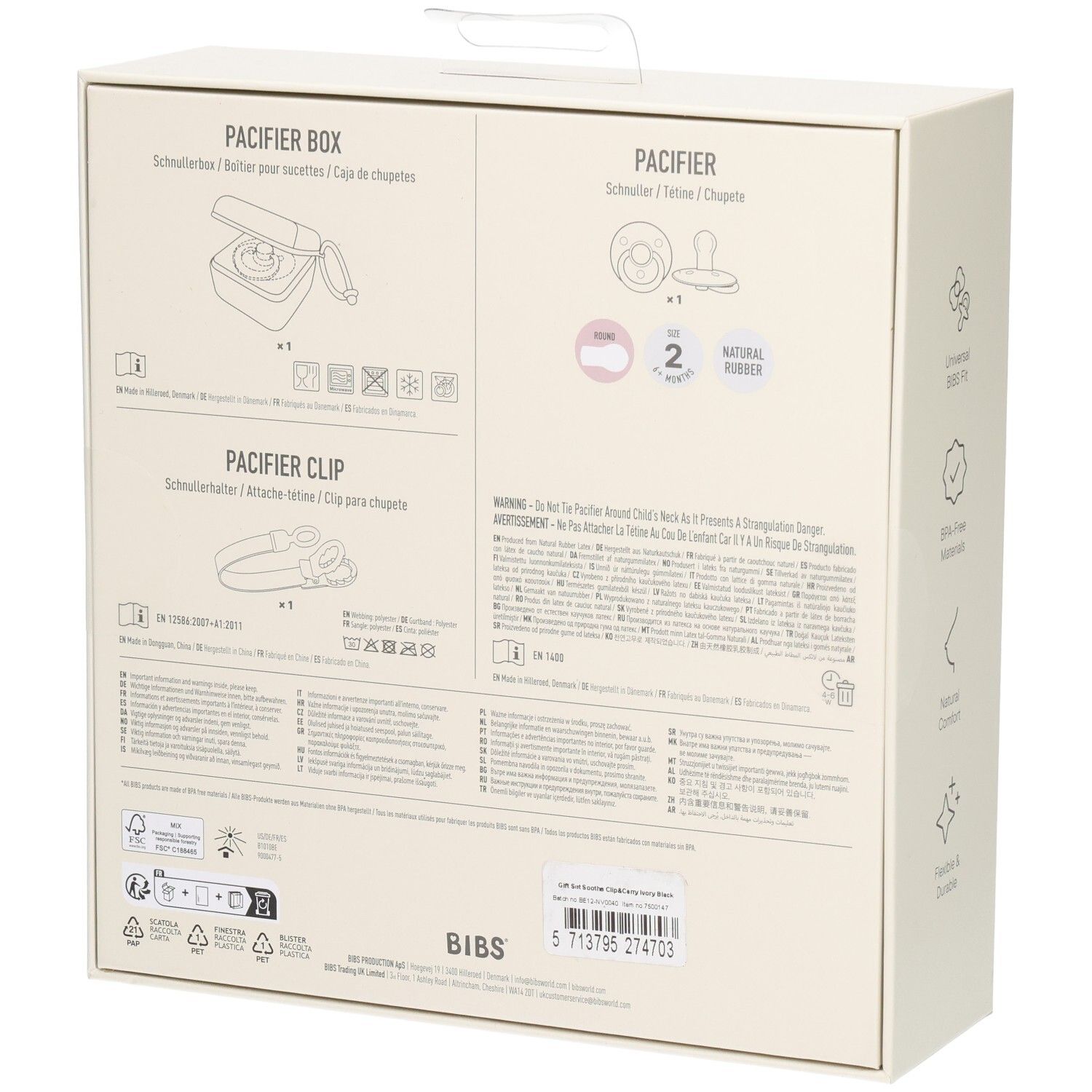 Dos de l'emballage du coffret cadeau. Texte: boîte à sucette, sucette, attache-sucette. Avertissements et informations.