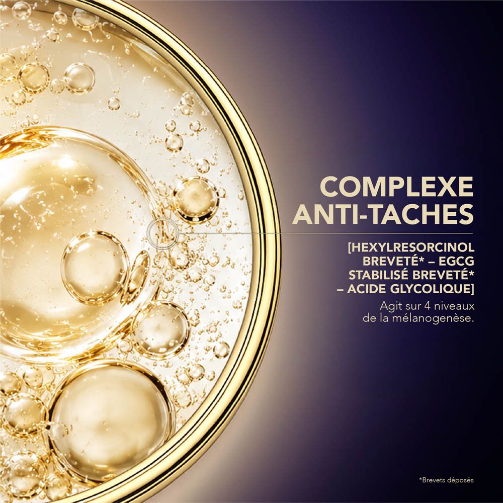 Flacon Lierac Premium Le Sérum Absolu Récupération Nocturne avec pipette, verre violet, bouchon doré.