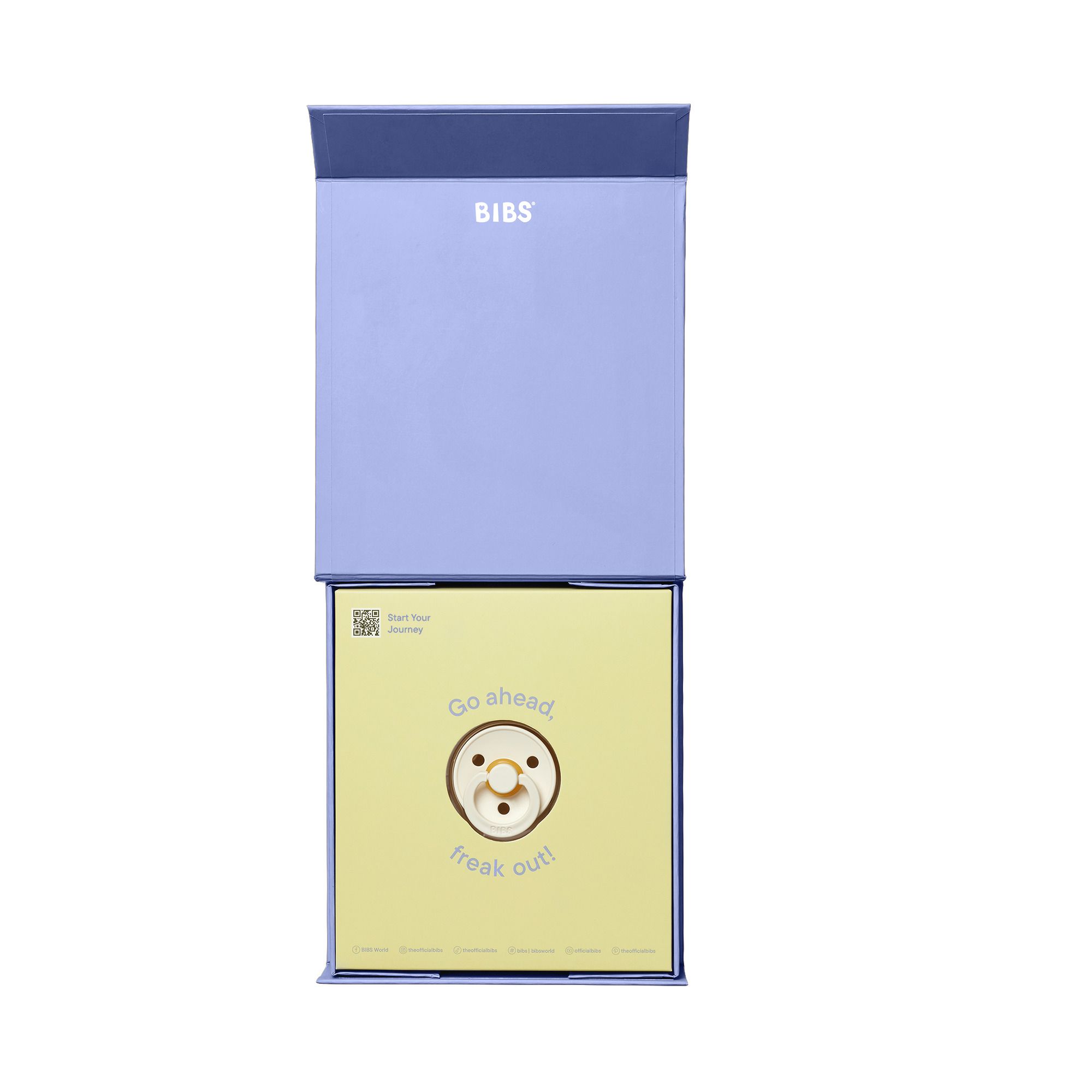 Coffret cadeau bleu clair ouvert avec tétine et impression. "Go ahead freak out!" est écrit à l'intérieur.