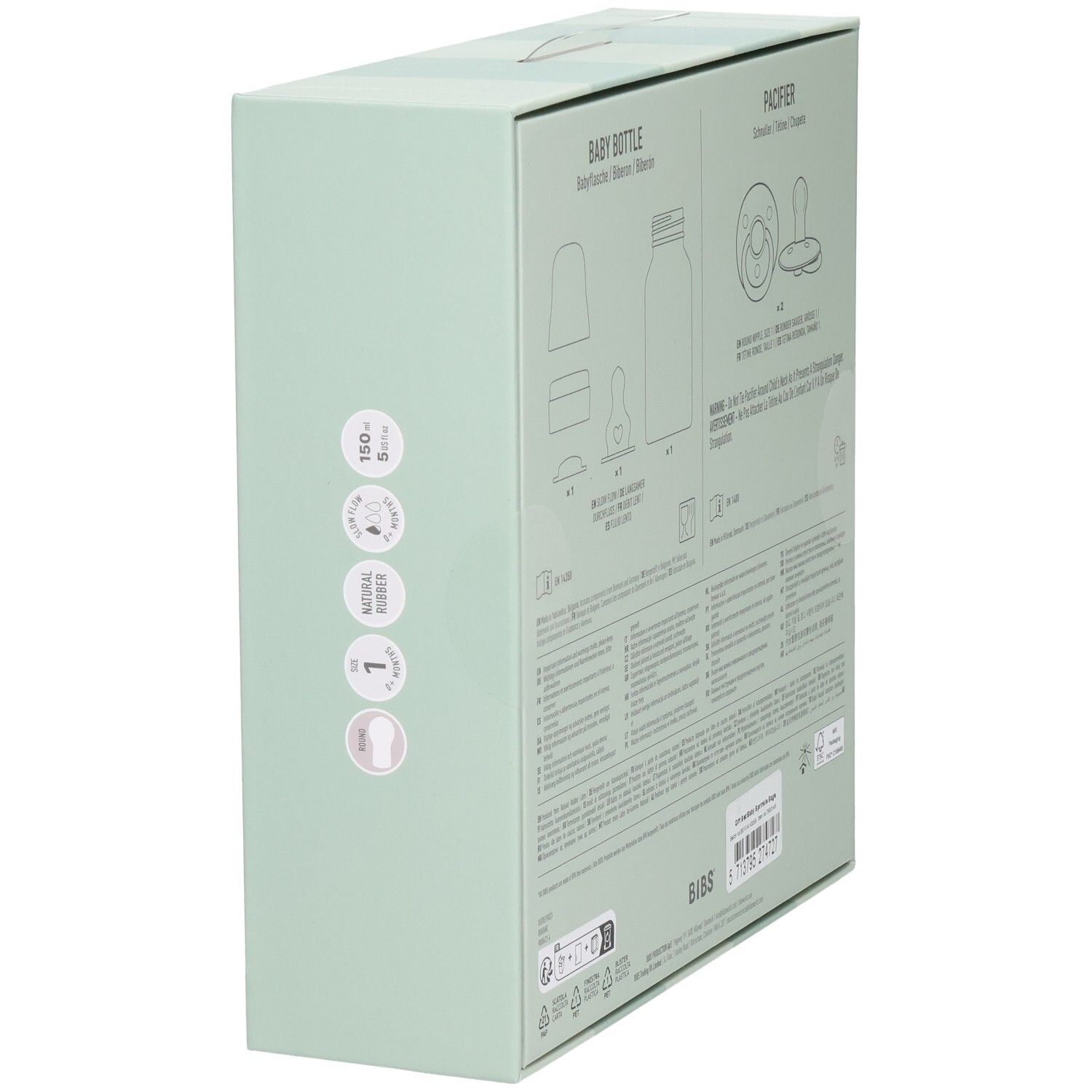Vue latérale du coffret cadeau avec illustrations et informations sur le produit. Contient biberon et sucette.