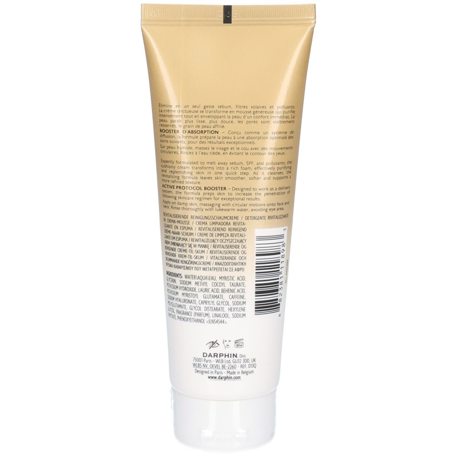 Dos du tube de crème-mousse. Tube beige doré avec bouchon blanc. Texte et code-barres.