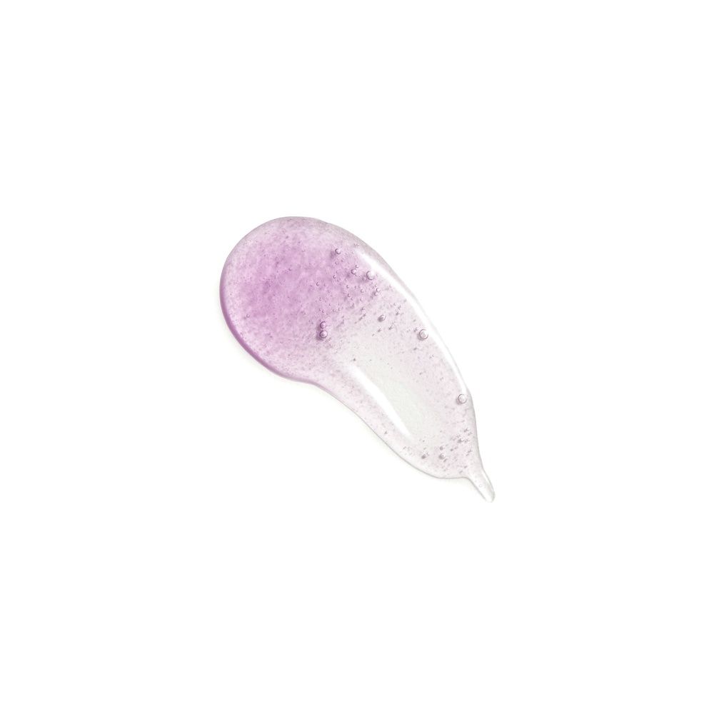 Nettoyant micro-exfoliant Neoretin Discrom Control dans un flacon pompe violet, vue de face.