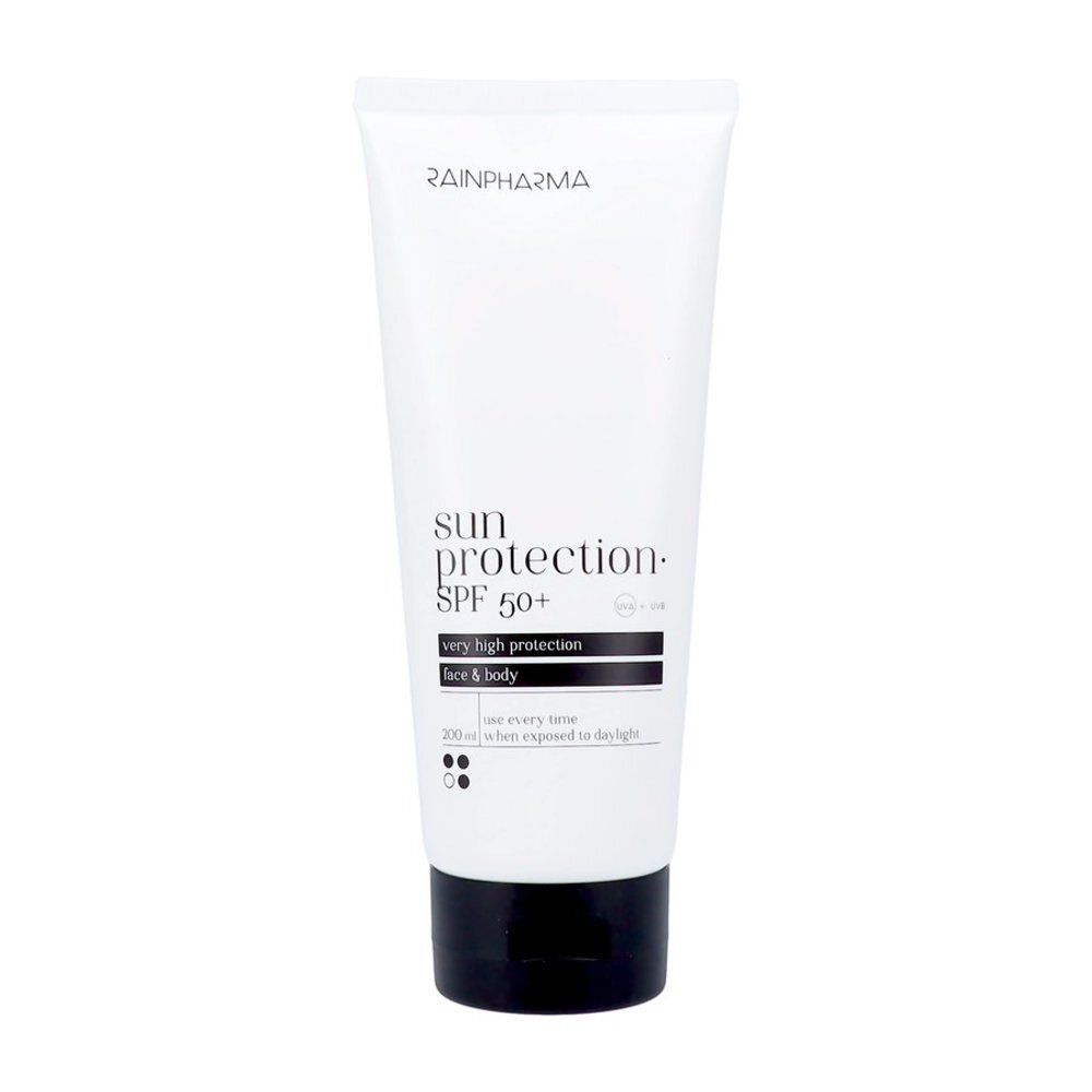 Arrière d'un tube blanc avec bouchon noir, protection solaire Rainpharma SPF 50+, avec instructions et ingrédients.