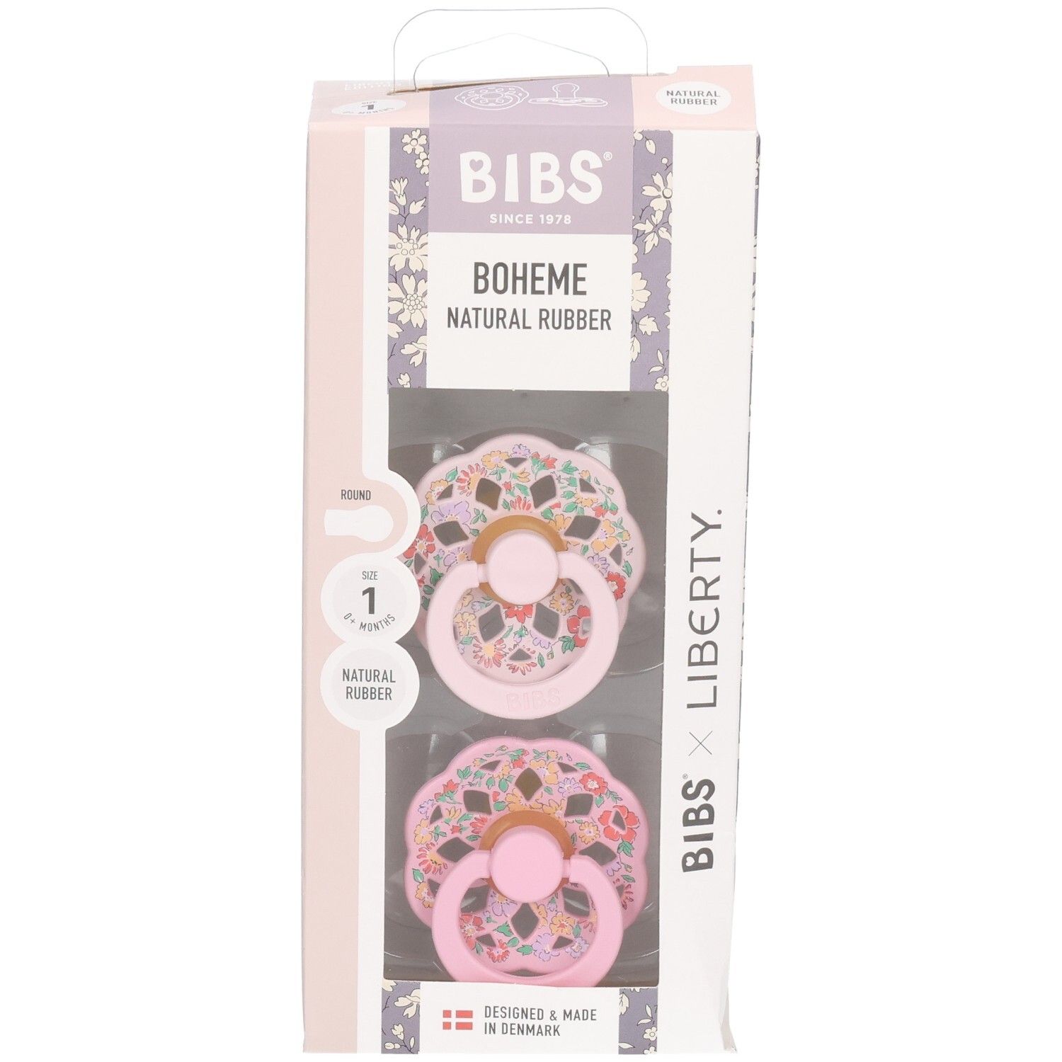 Sucette BIBS Boheme x Liberty, T. 1, caoutchouc naturel, rose à motif floral, face avant emballage.