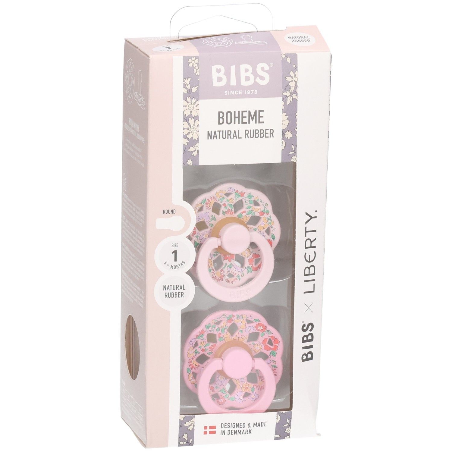 Sucette BIBS Boheme x Liberty, T. 1, caoutchouc naturel, rose à motif floral, face avant emballage.