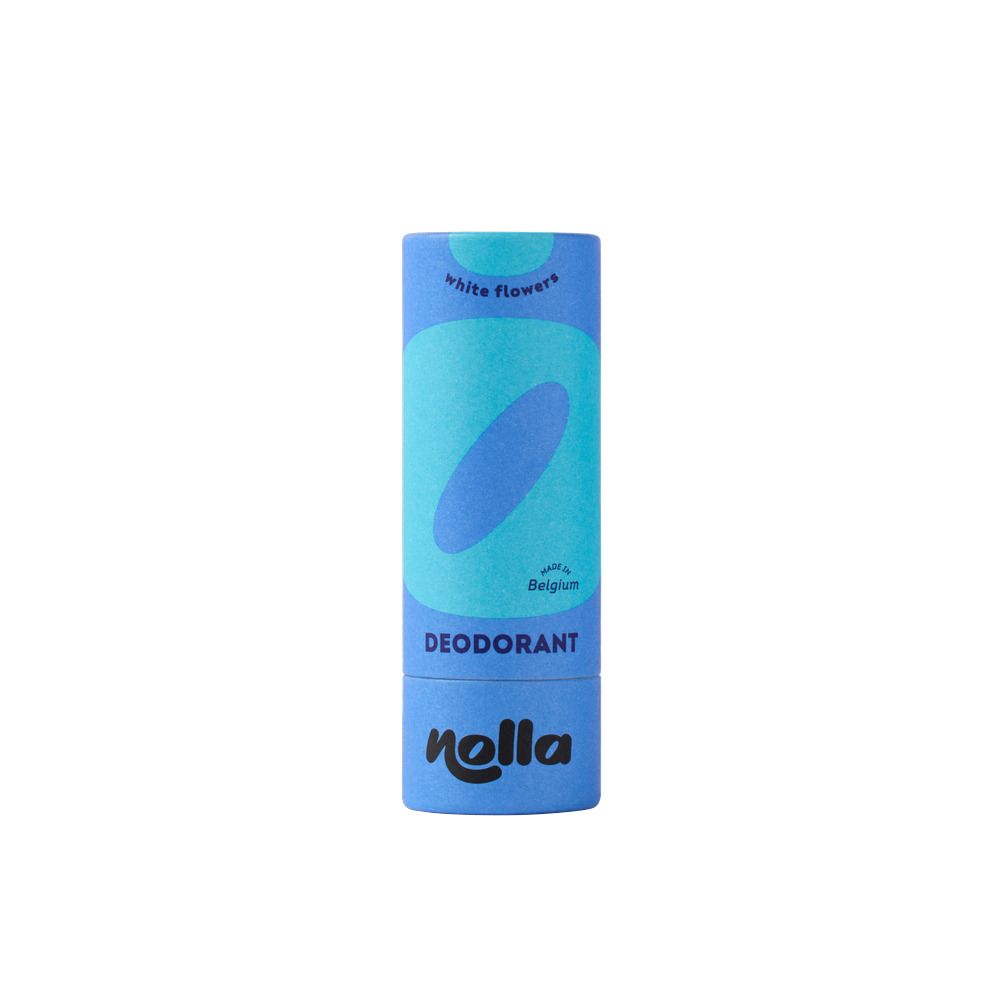 Déodorant Nolla dans un cylindre en carton bleu avec des formes abstraites bleu-blanc. "DEODORANT" et "nolla" sont visibles.