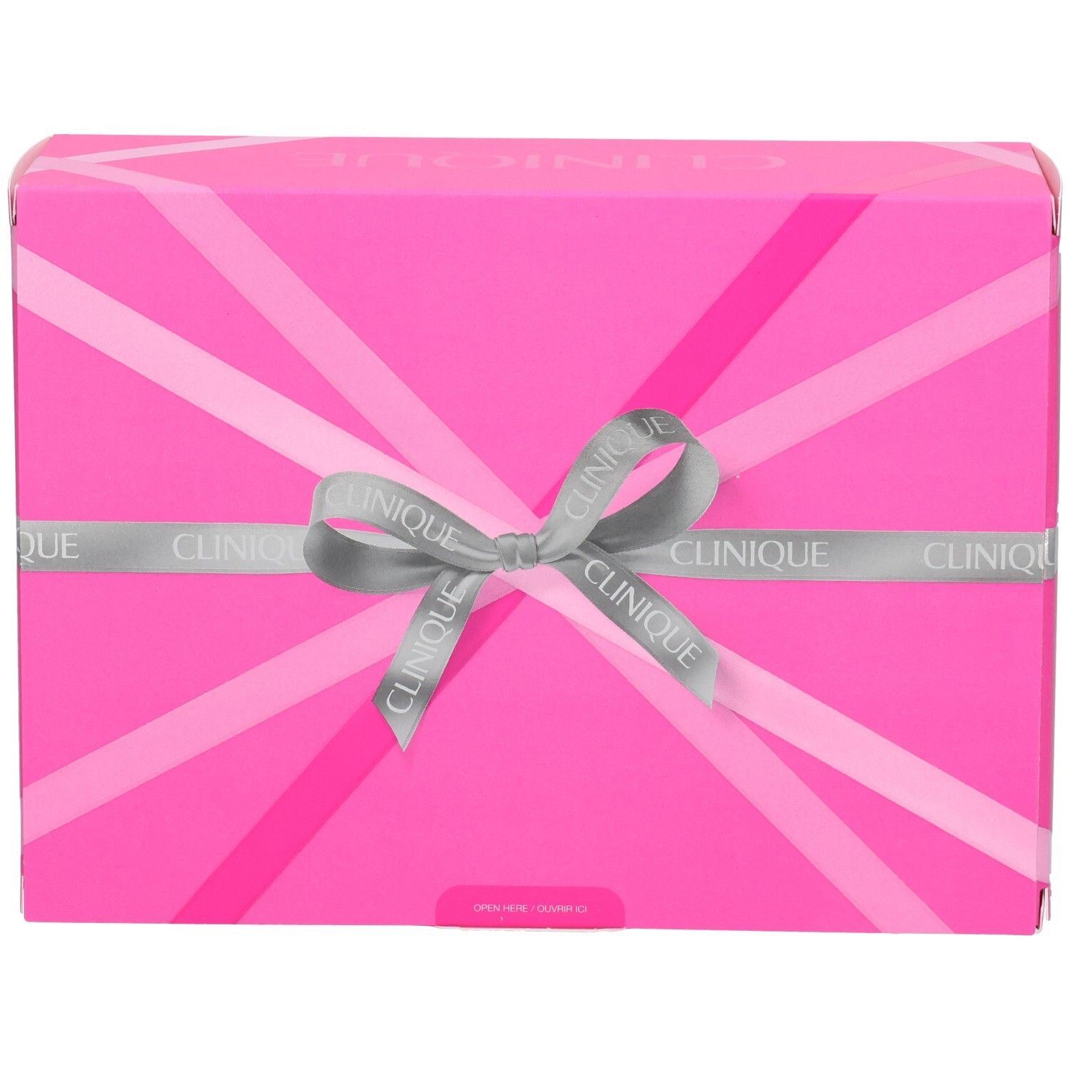 Boîte cadeau Clinique fermée avec motif rose et nœud.